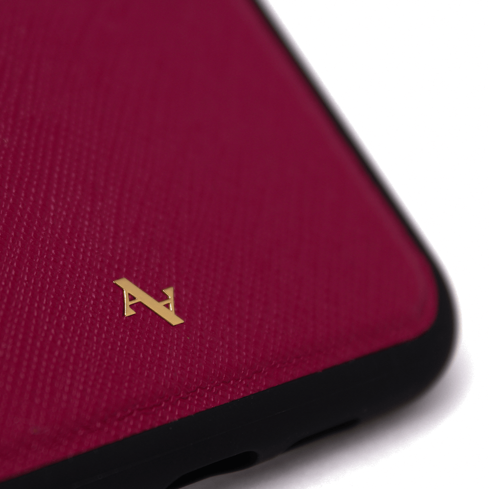 Moon River Red Leather Case for iPhone 12 Pro Max, featuring saffiano leather and soft rubber edges for protection.