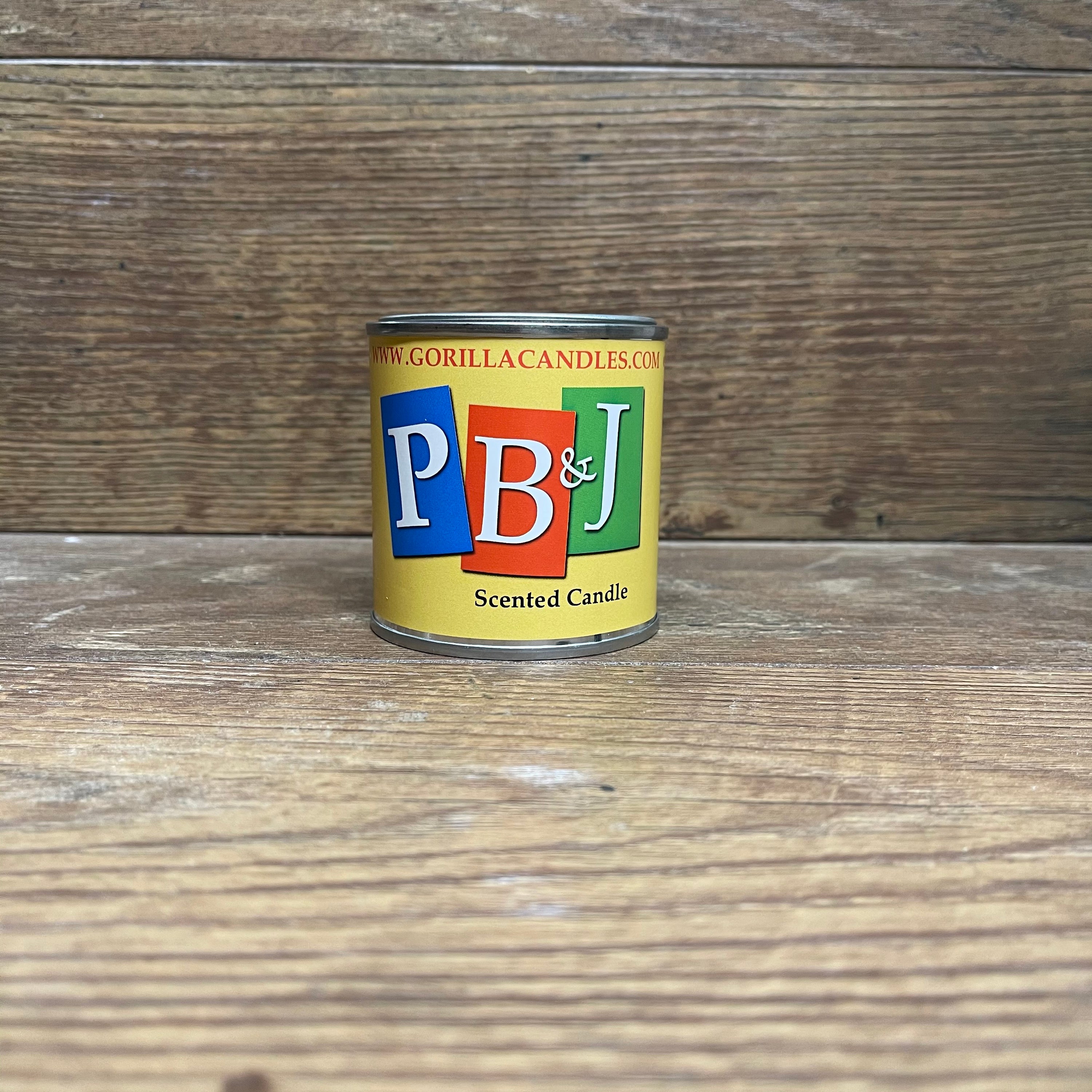 Peanut Butter & Jelly scented candle in a retro paint can, showcasing a nostalgic design.