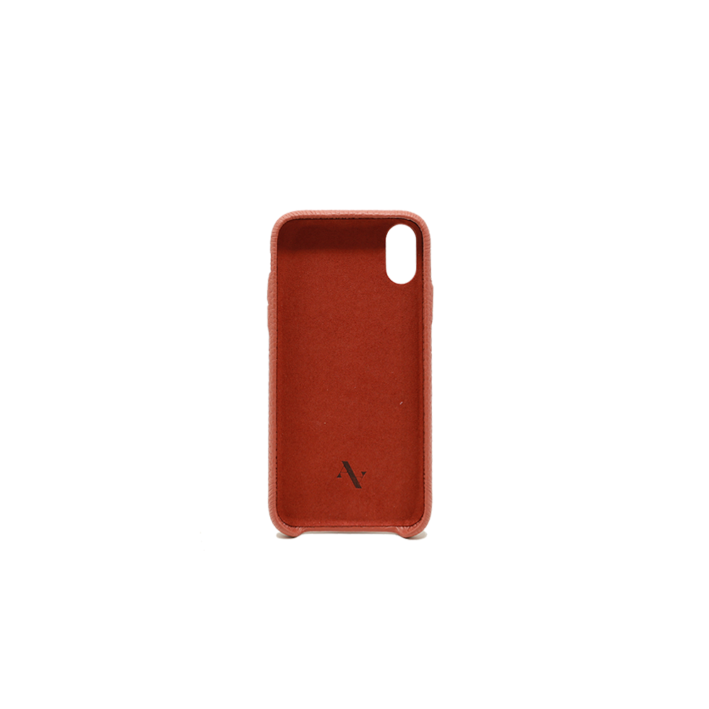 Stylish terracotta iPhone XR case made from genuine pebble leather, featuring a slim design and personalization options.