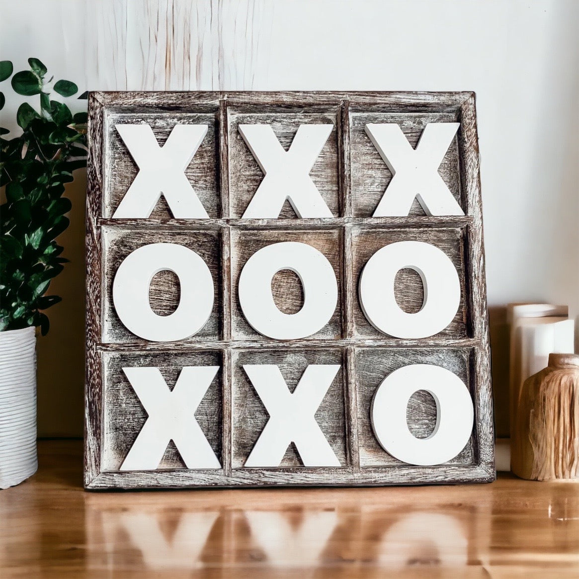 Rustic Tic Tac Toe game featuring a handmade wooden base with removable white and blackened game pieces, perfect for home decor and family fun.