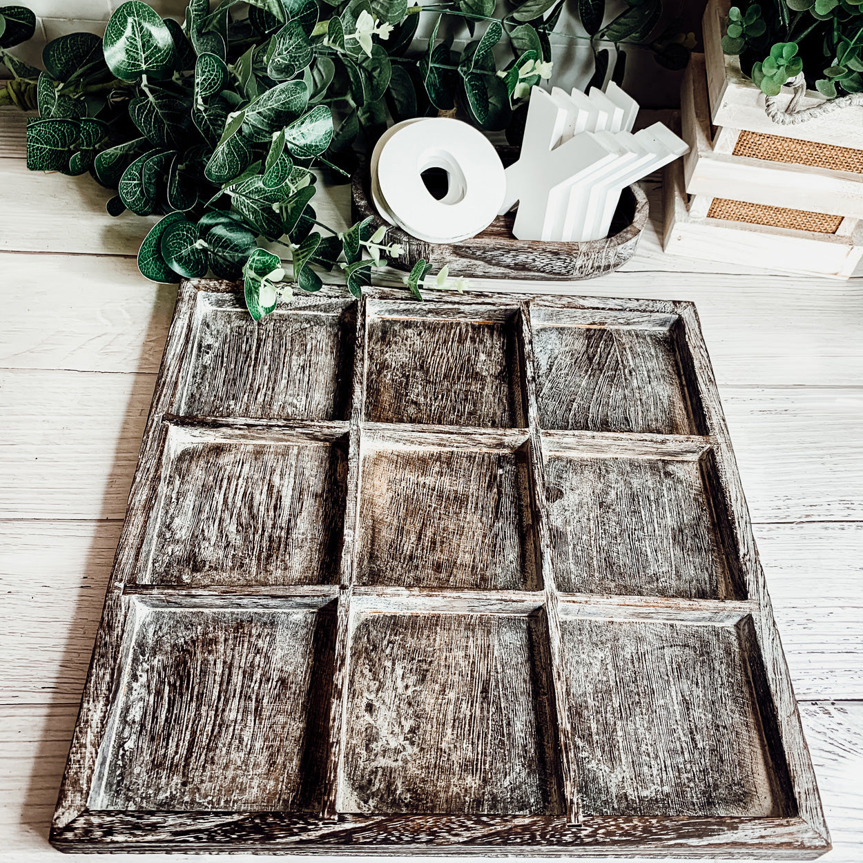 Rustic Tic Tac Toe game featuring a handmade wooden base with removable white and blackened game pieces, perfect for home decor and family fun.