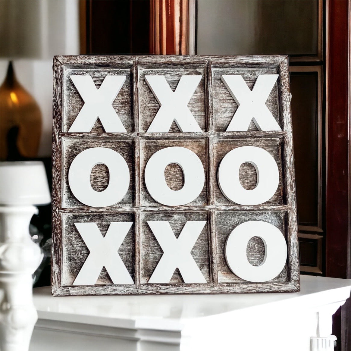 Rustic Tic Tac Toe game featuring a handmade wooden base with removable white and blackened game pieces, perfect for home decor and family fun.