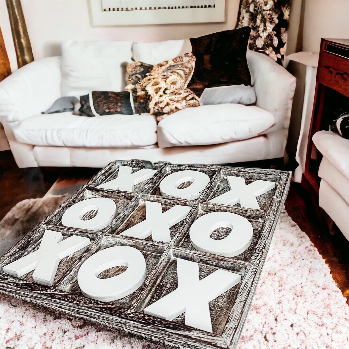 Rustic Tic Tac Toe game featuring a handmade wooden base with removable white and blackened game pieces, perfect for home decor and family fun.