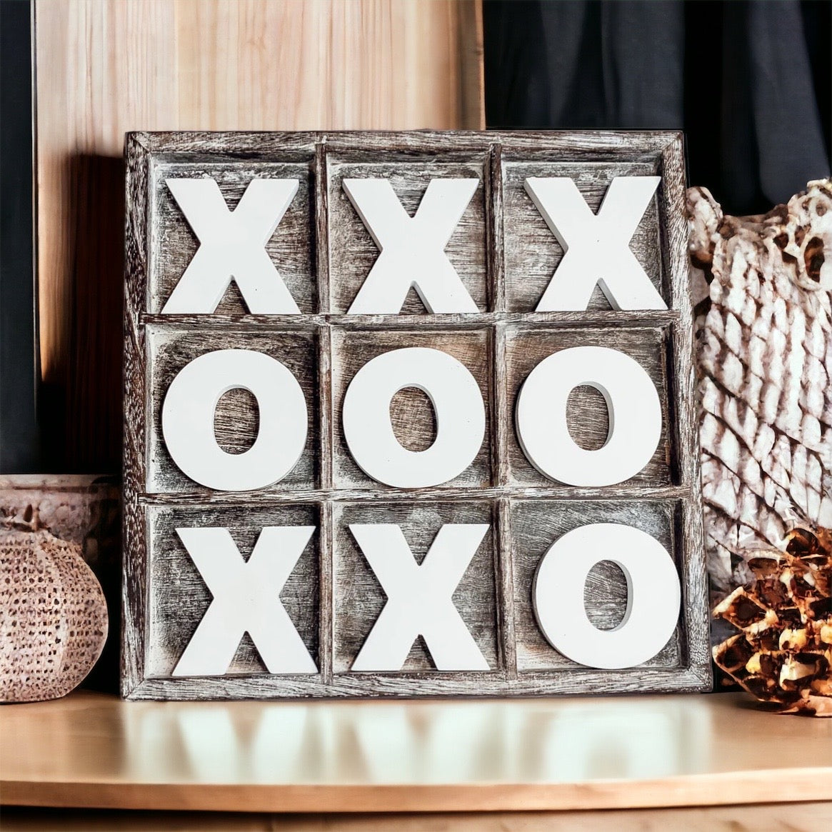 Rustic Tic Tac Toe game featuring a handmade wooden base with removable white and blackened game pieces, perfect for home decor and family fun.