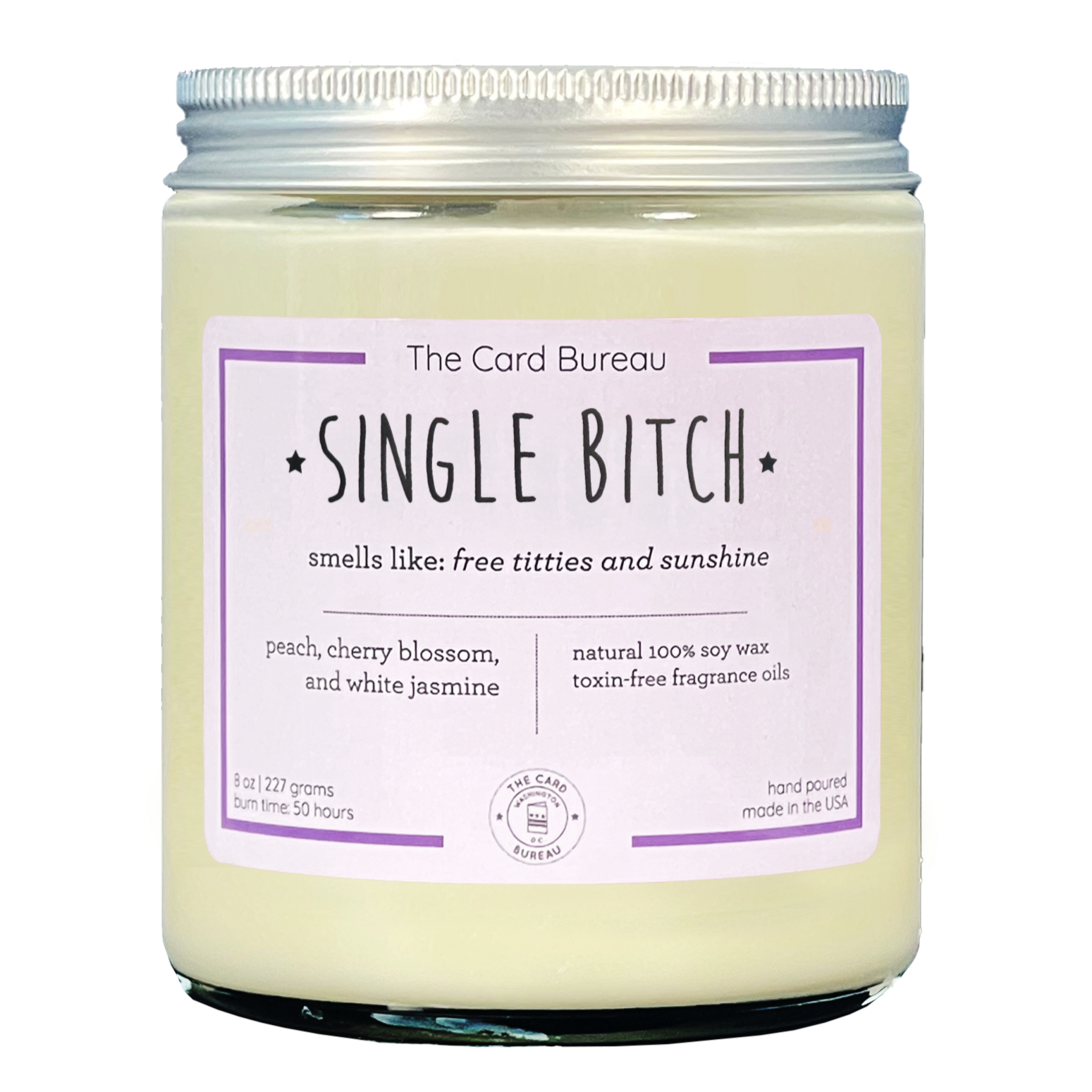 Single Bitch Candle in a glass jar with a tin lid, featuring a vibrant label and surrounded by decorative elements, showcasing its peach, cherry blossom, and jasmine scent.