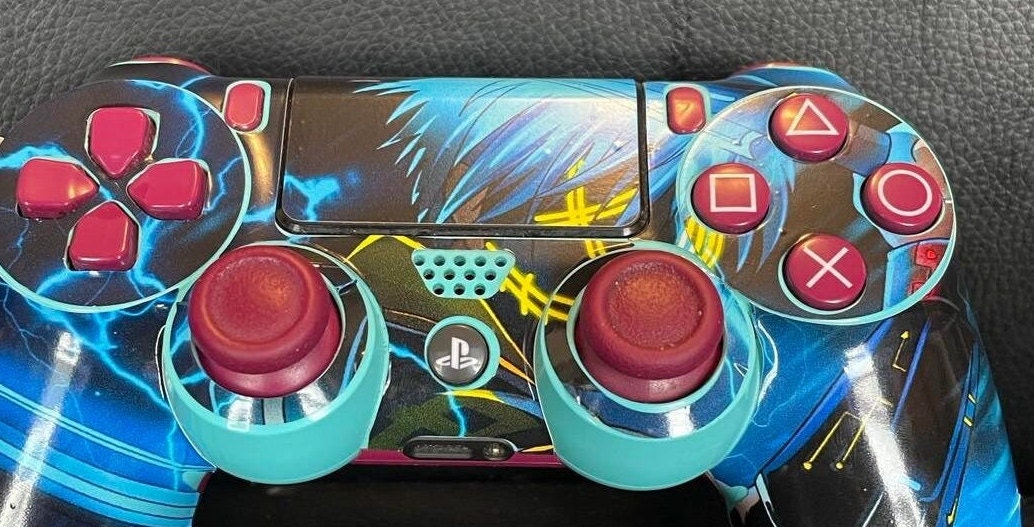 Galaxy Space Planets decal wrap for PS4 and PS4 Pro controller, showcasing vibrant cosmic designs.