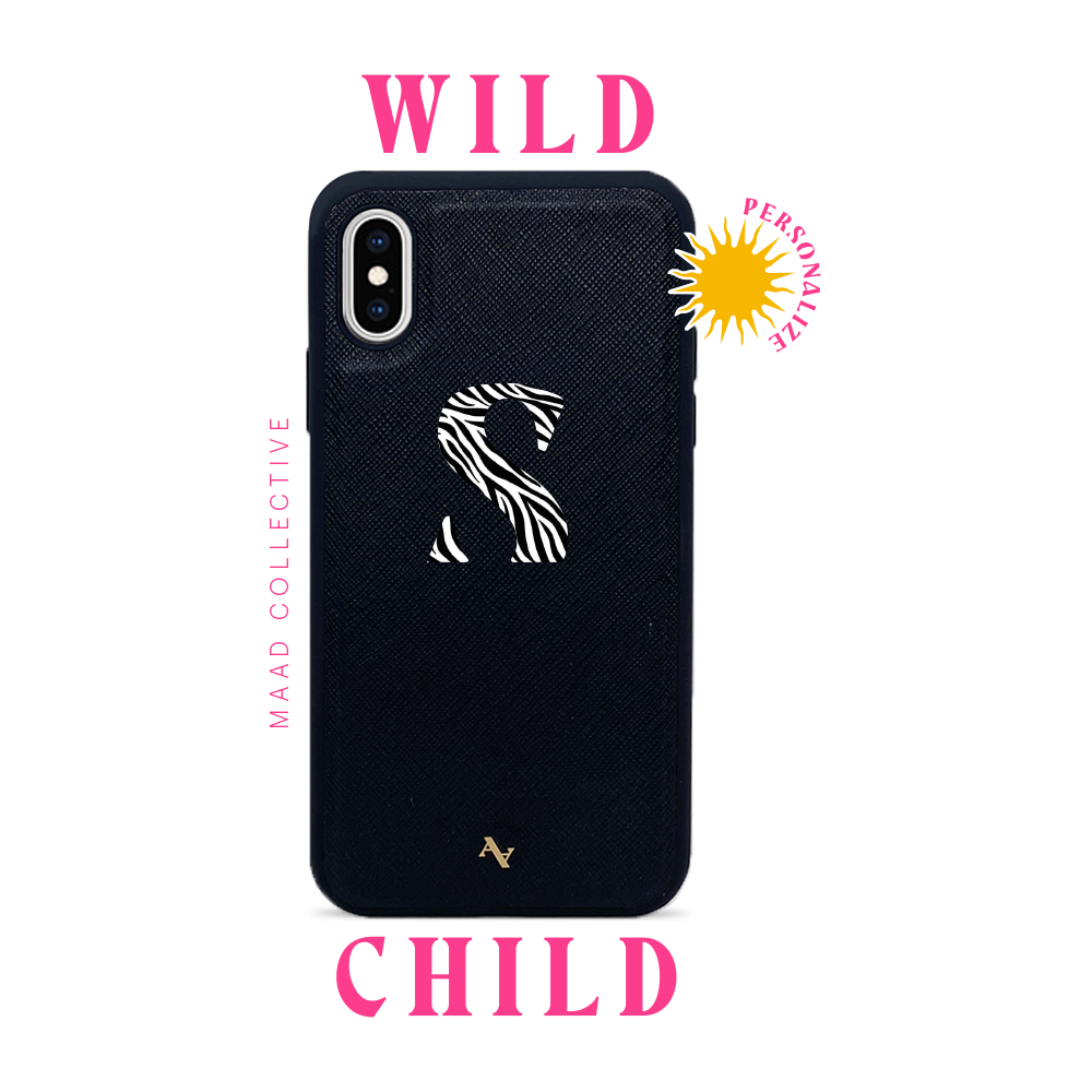 Wild Child Black Leather Case for iPhone X/XS featuring saffiano leather and rubber rim, customizable with unique typography and animal prints.