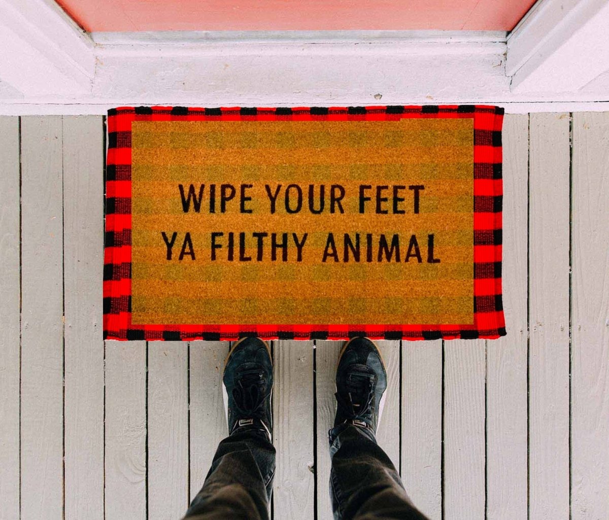 Wipe Your Feet doormat with humorous black script on natural coir background, perfect for outdoor use.