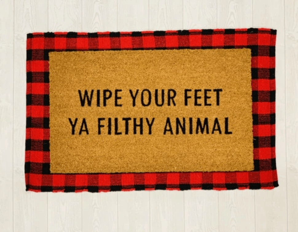 Wipe Your Feet doormat with humorous black script on natural coir background, perfect for outdoor use.