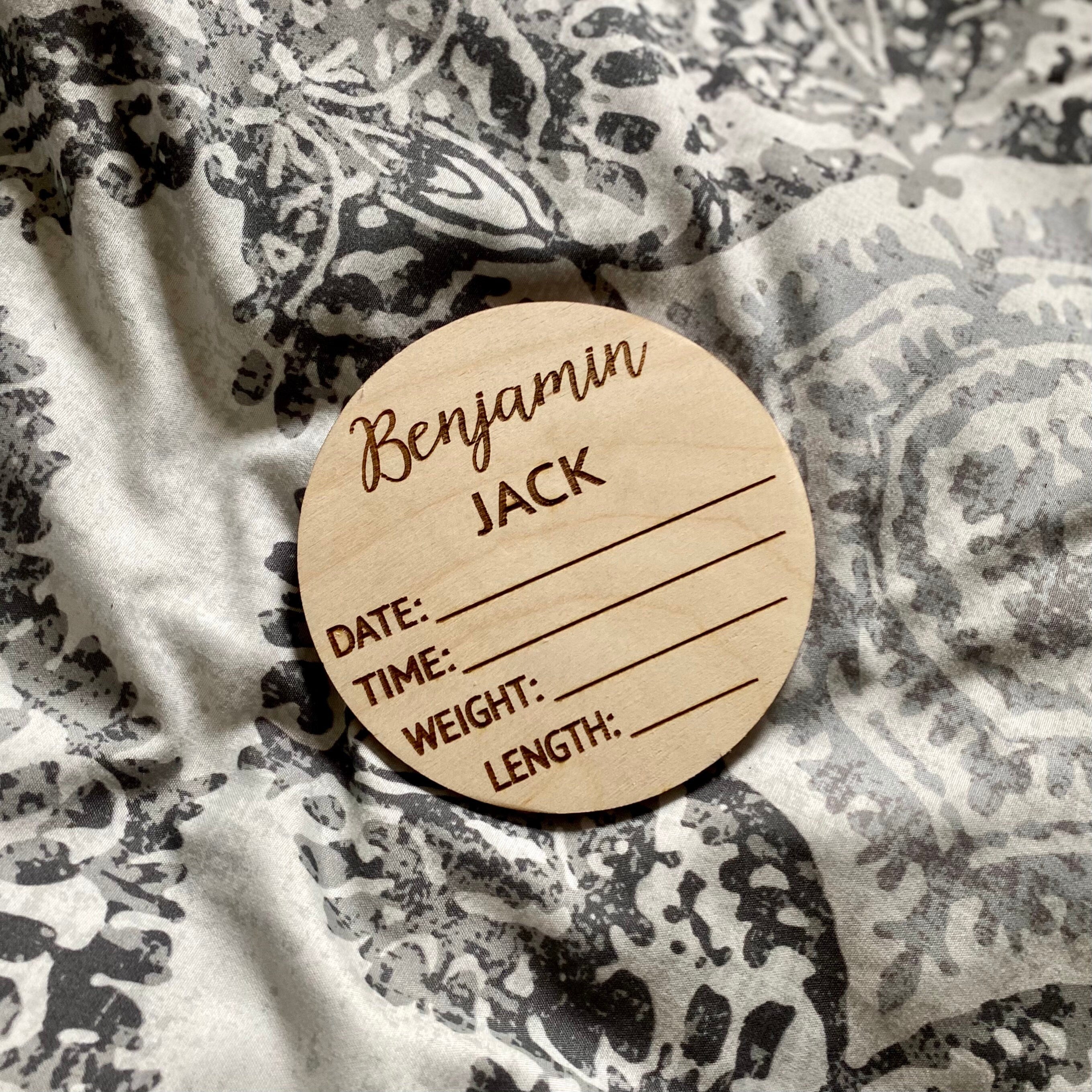 A beautifully crafted birch wood milestone card for documenting baby's birth stats, featuring laser engraving and a smooth finish.