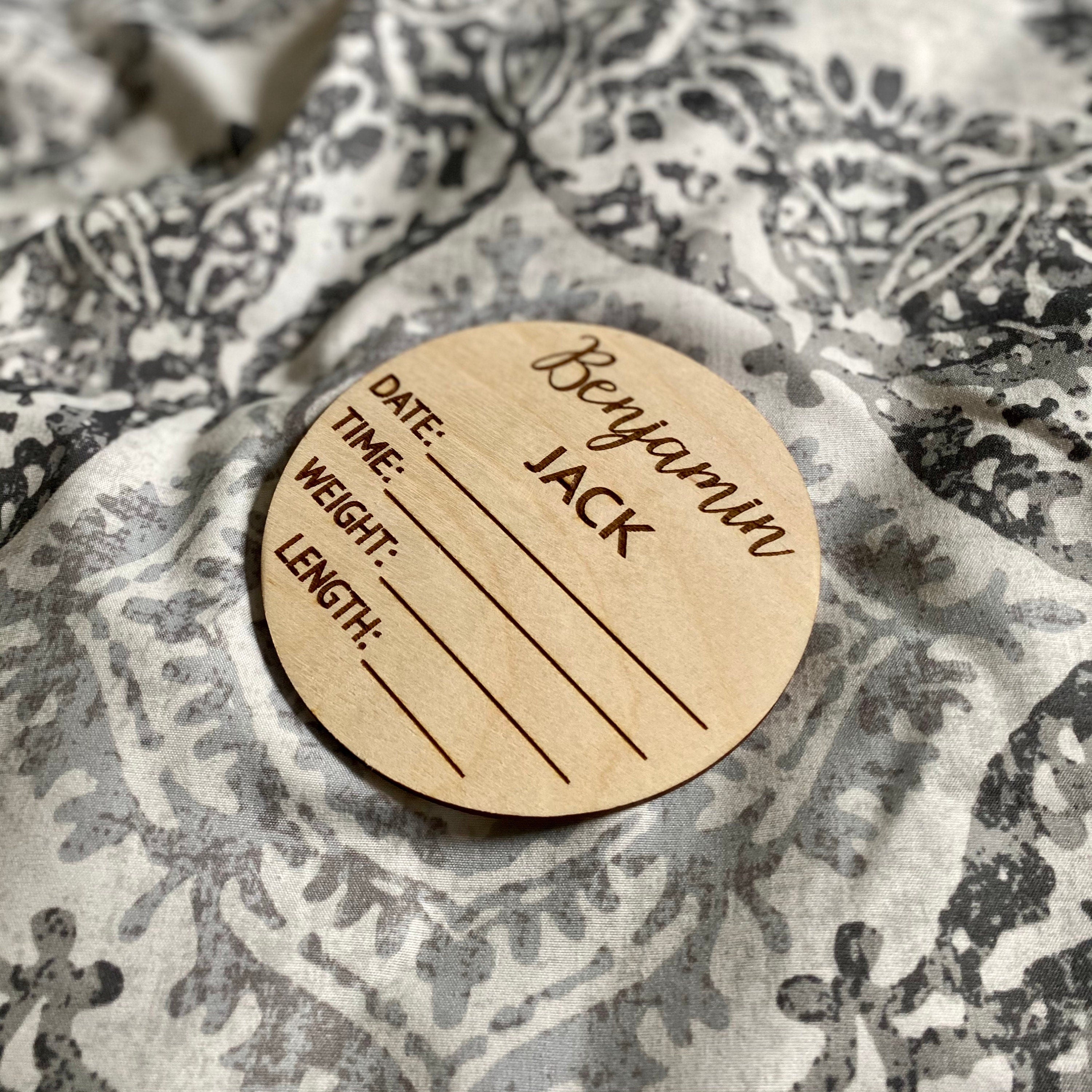 A beautifully crafted birch wood milestone card for documenting baby's birth stats, featuring laser engraving and a smooth finish.