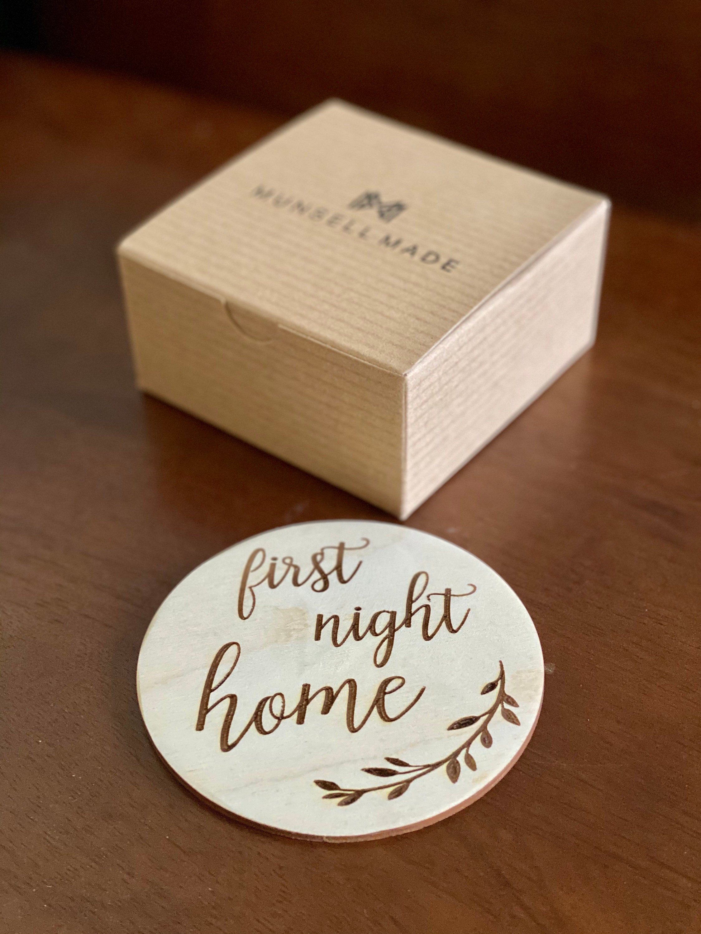 A set of 16 wooden milestone cards for babies, beautifully engraved on Birch wood, displayed in a Kraft box.