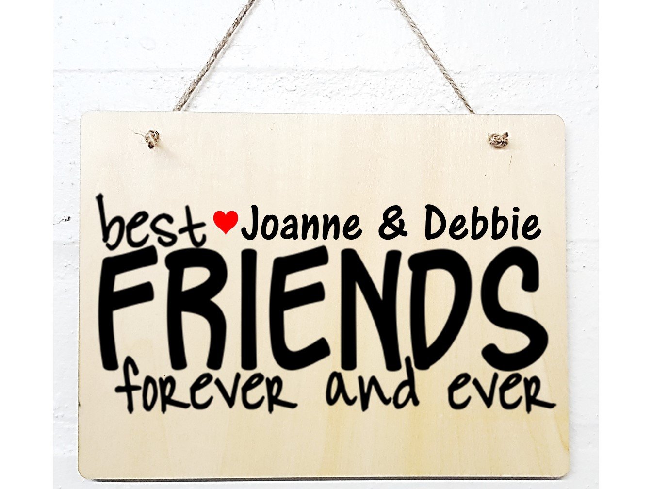 A beautifully crafted wooden plaque featuring a personalised friendship quote, measuring 15cm x 20cm, perfect for celebrating friendship.