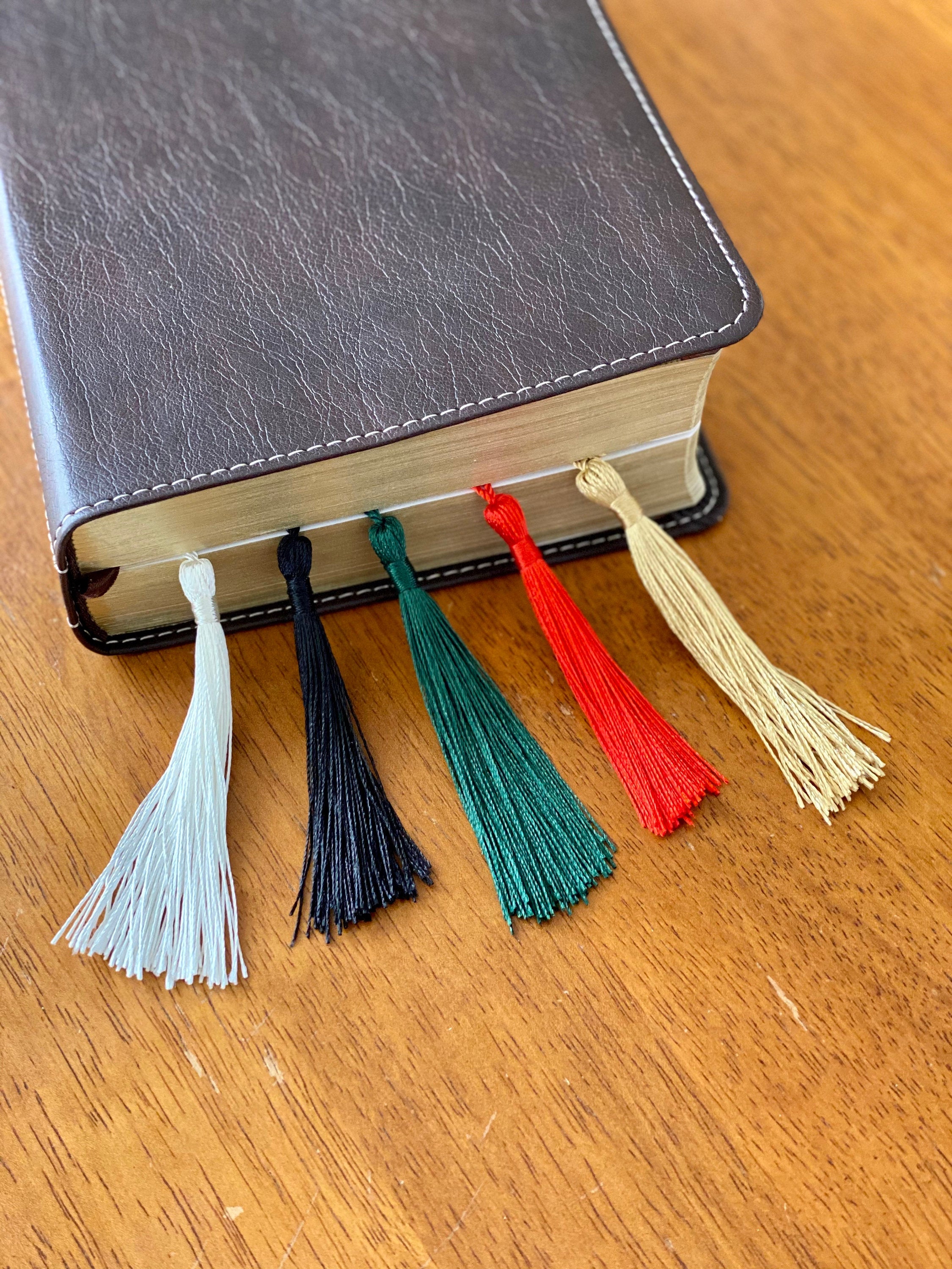 Engraved wood bookmark featuring silhouettes of birds on branches, made from Cherry hardwood with a colorful tassel.