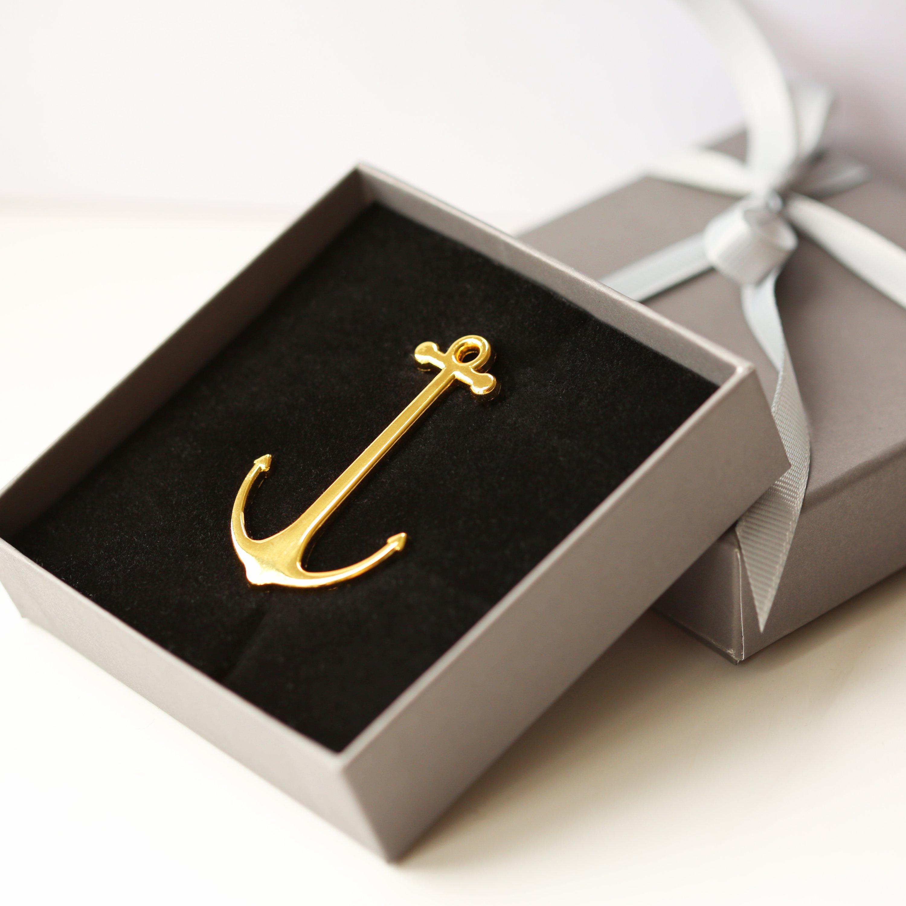 Gold and Rose Gold Book Anchor, elegantly designed to hold books open, featuring personalized engraving options.