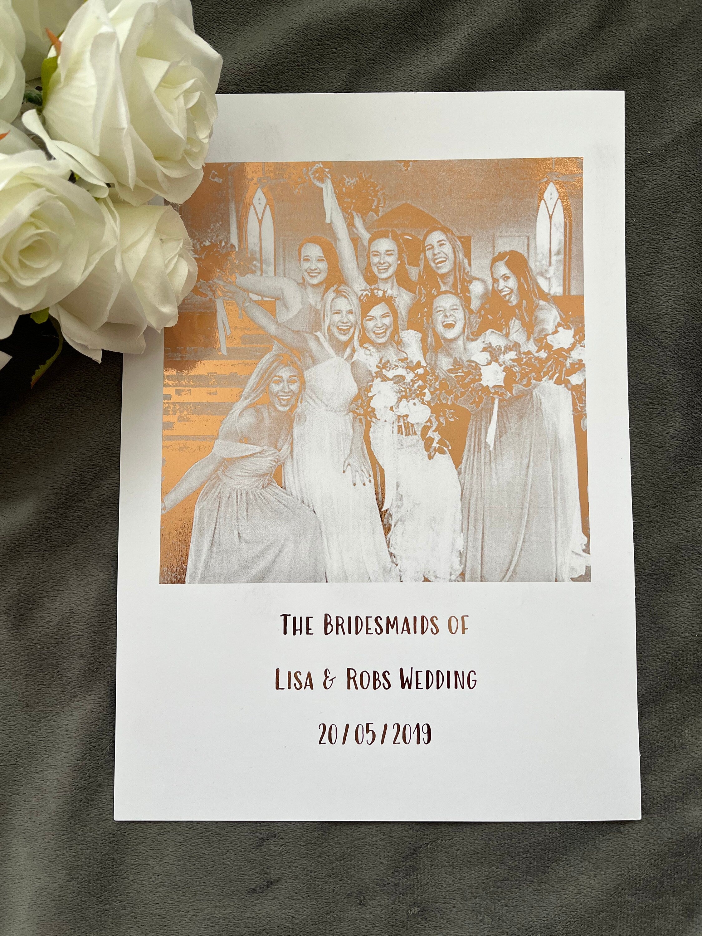 A beautiful foil print featuring bridesmaids in rose gold on a white background, personalized with names and wedding date.