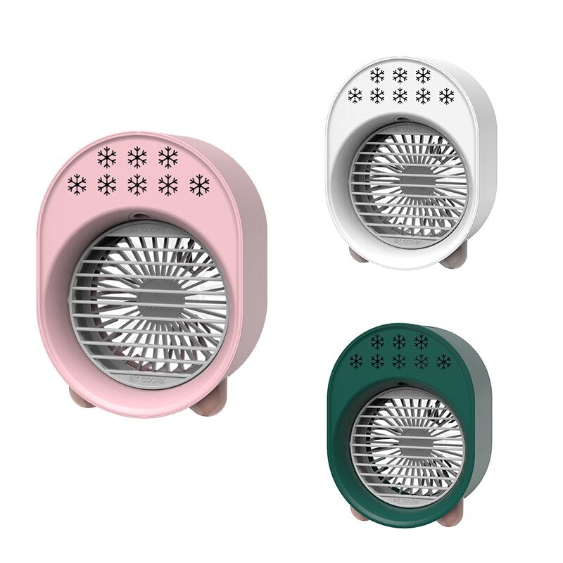 Compact USB Desk Mini Air Cooling Fan in pink, white, and green colors, showcasing its sleek design and LED light feature.