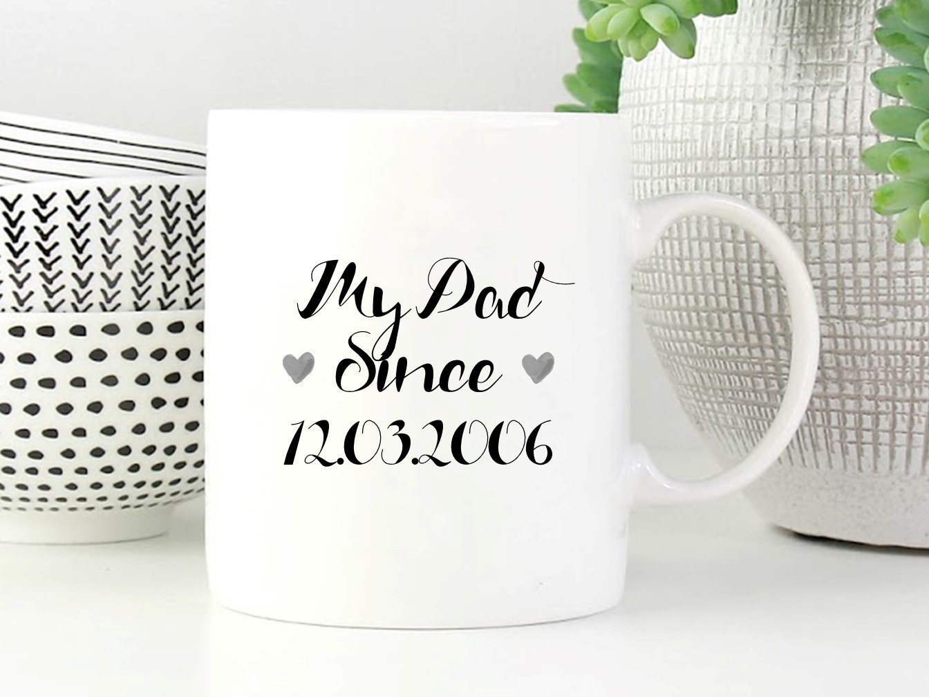 A beautifully designed personalised mug for dads, featuring custom text and a stylish gift box.