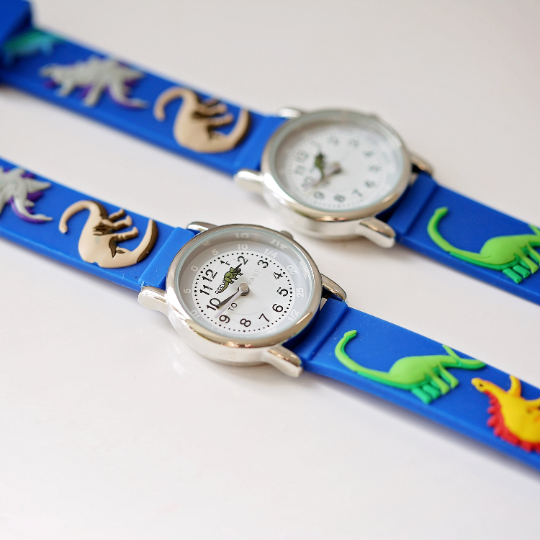 Engraved Kids 3D Dinosaur Watch in blue with a playful dinosaur second hand and personalized engraving.