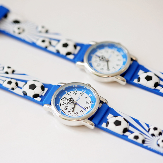 Engraved Kids 3D Football Watch in blue with rotating football second hand and personalised engraving.