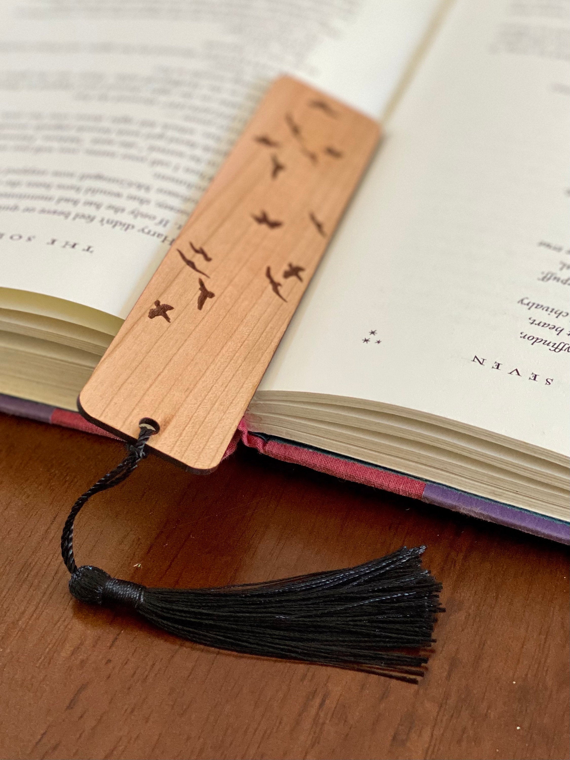 Elegant Flying Birds Engraved Wood Bookmark made of cherry hardwood with bird silhouettes and a colorful tassel.