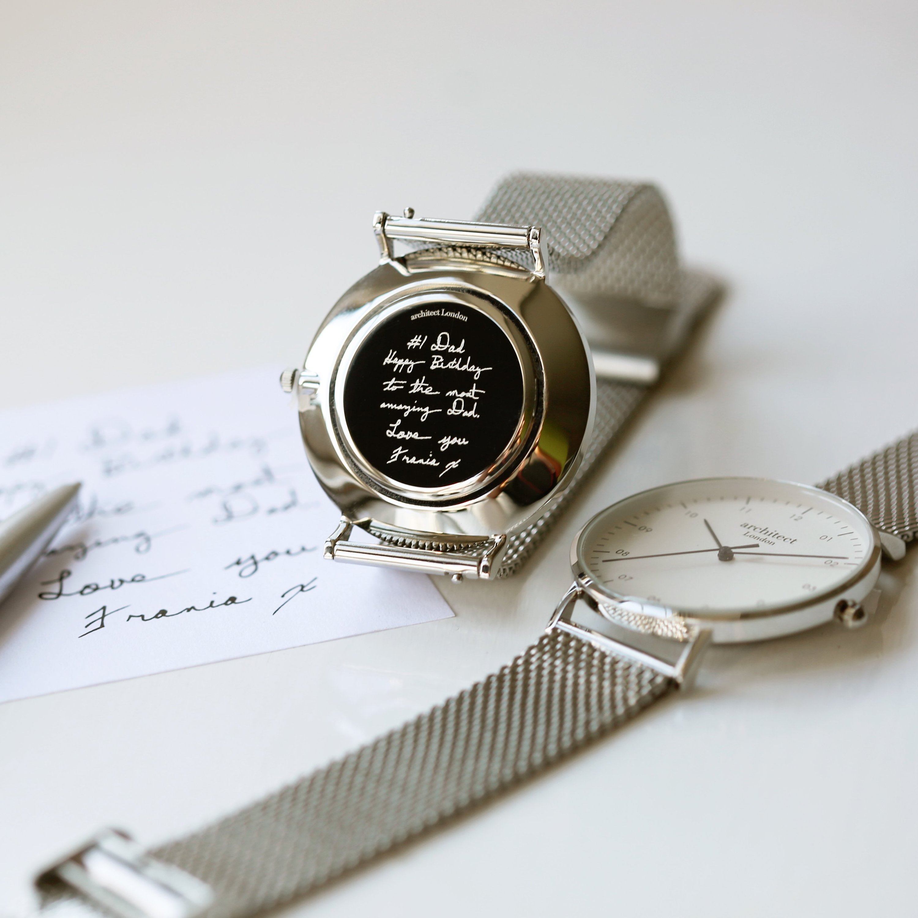 Men's Architect Zephyr watch featuring a steel silver mesh strap and personalized handwriting engraving on the back.