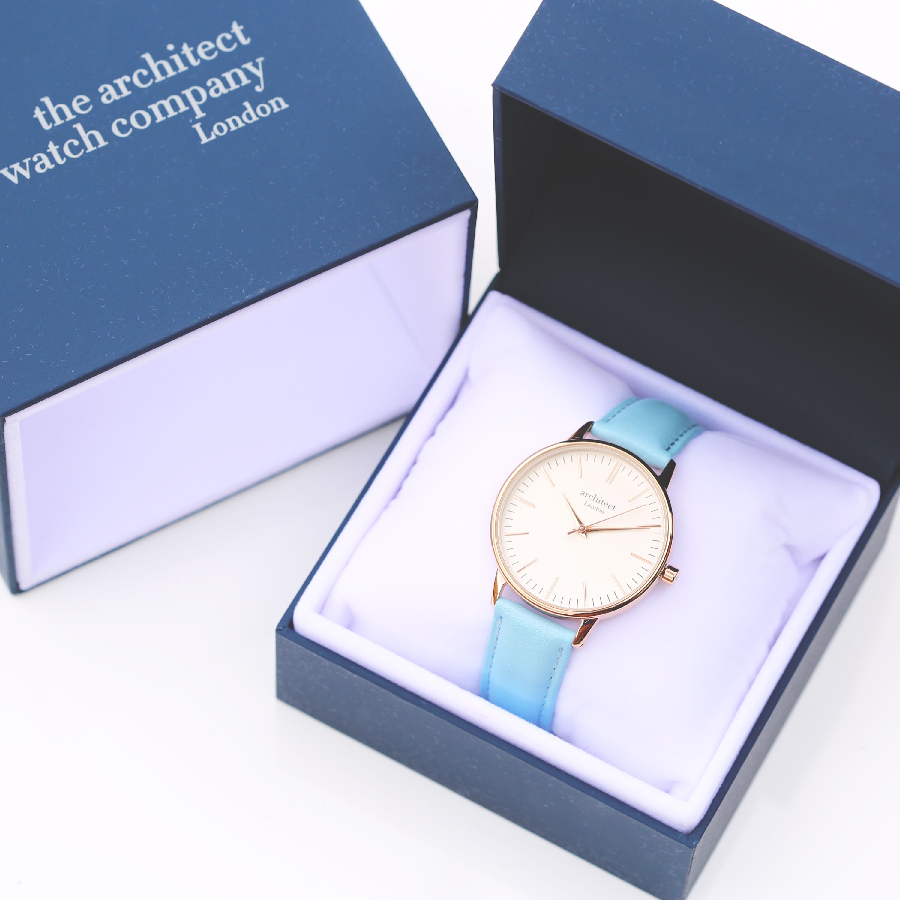 Ladies Architēct Blanc watch featuring a light blue genuine leather strap and personalized handwriting engraving on the back.