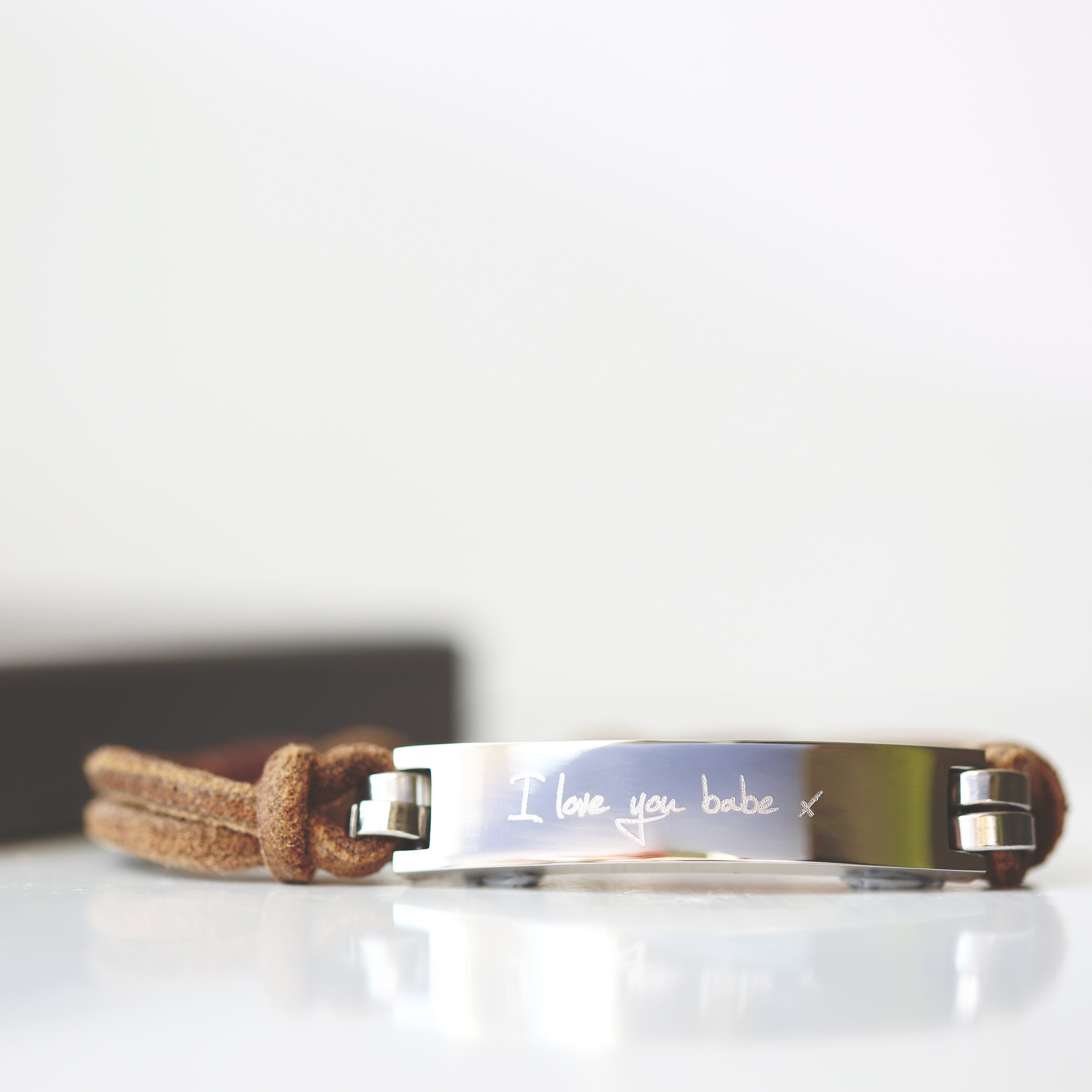 Men's Leather Tan Bracelet featuring personalized handwriting engraving, made from genuine leather with a snap-lock clasp.