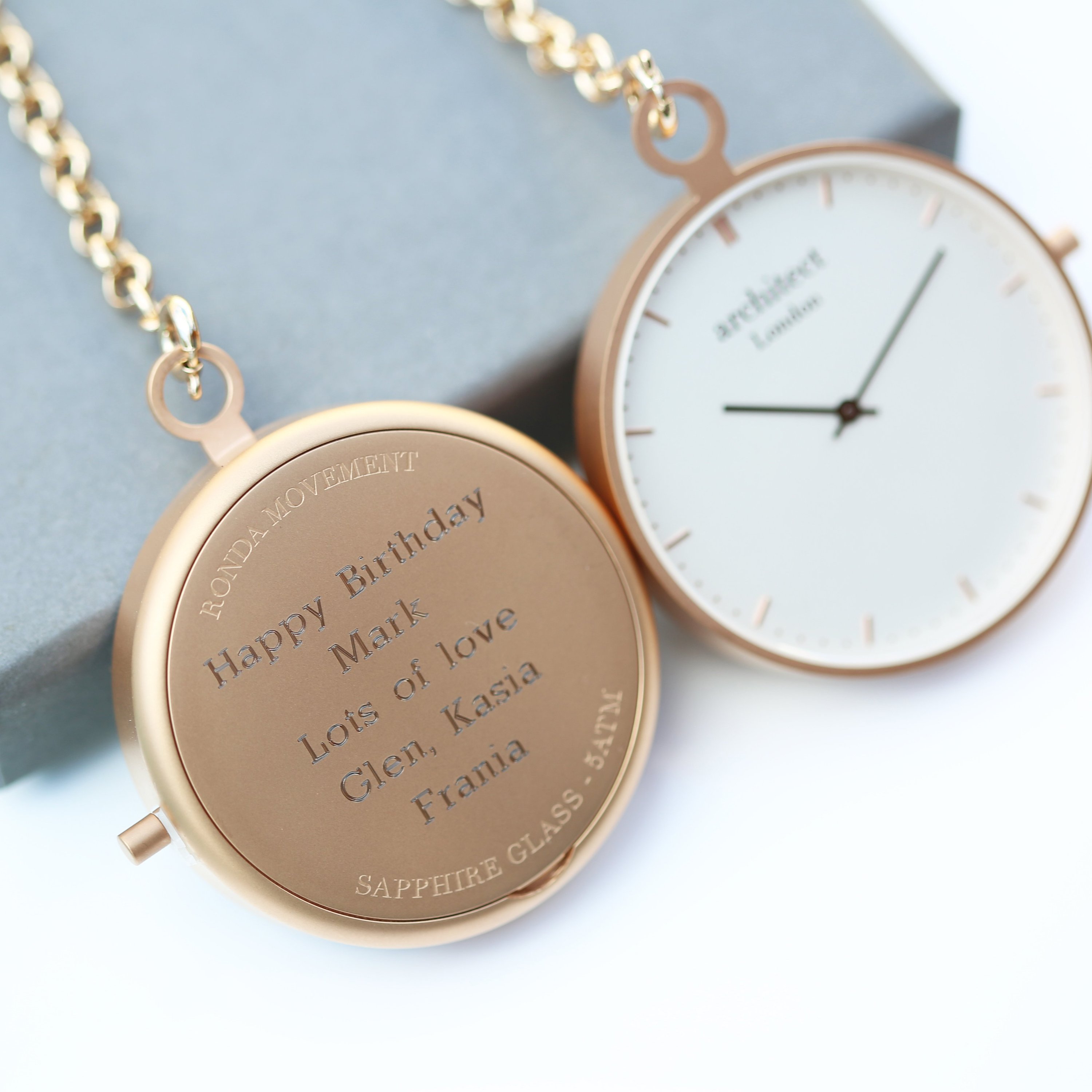 Modern Pocket Watch in rose gold with sapphire glass and engravable back, showcasing a sleek design and luxurious finish.