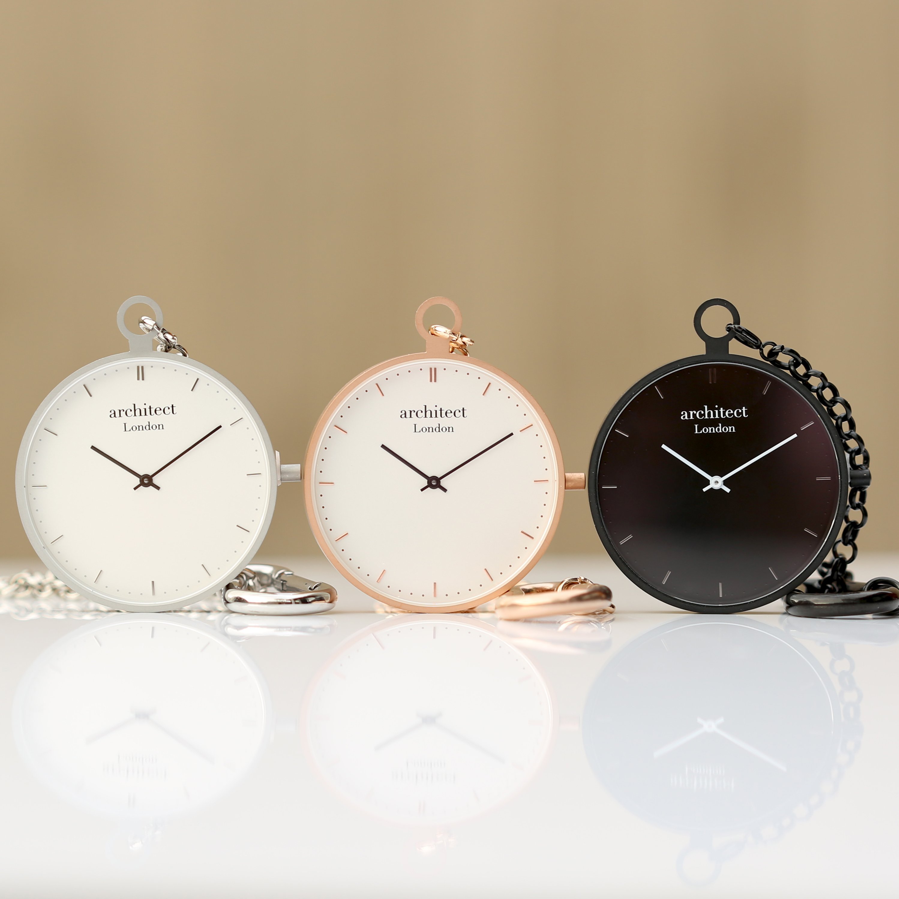 Modern Pocket Watch in rose gold with sapphire glass and engravable back, showcasing a sleek design and luxurious finish.