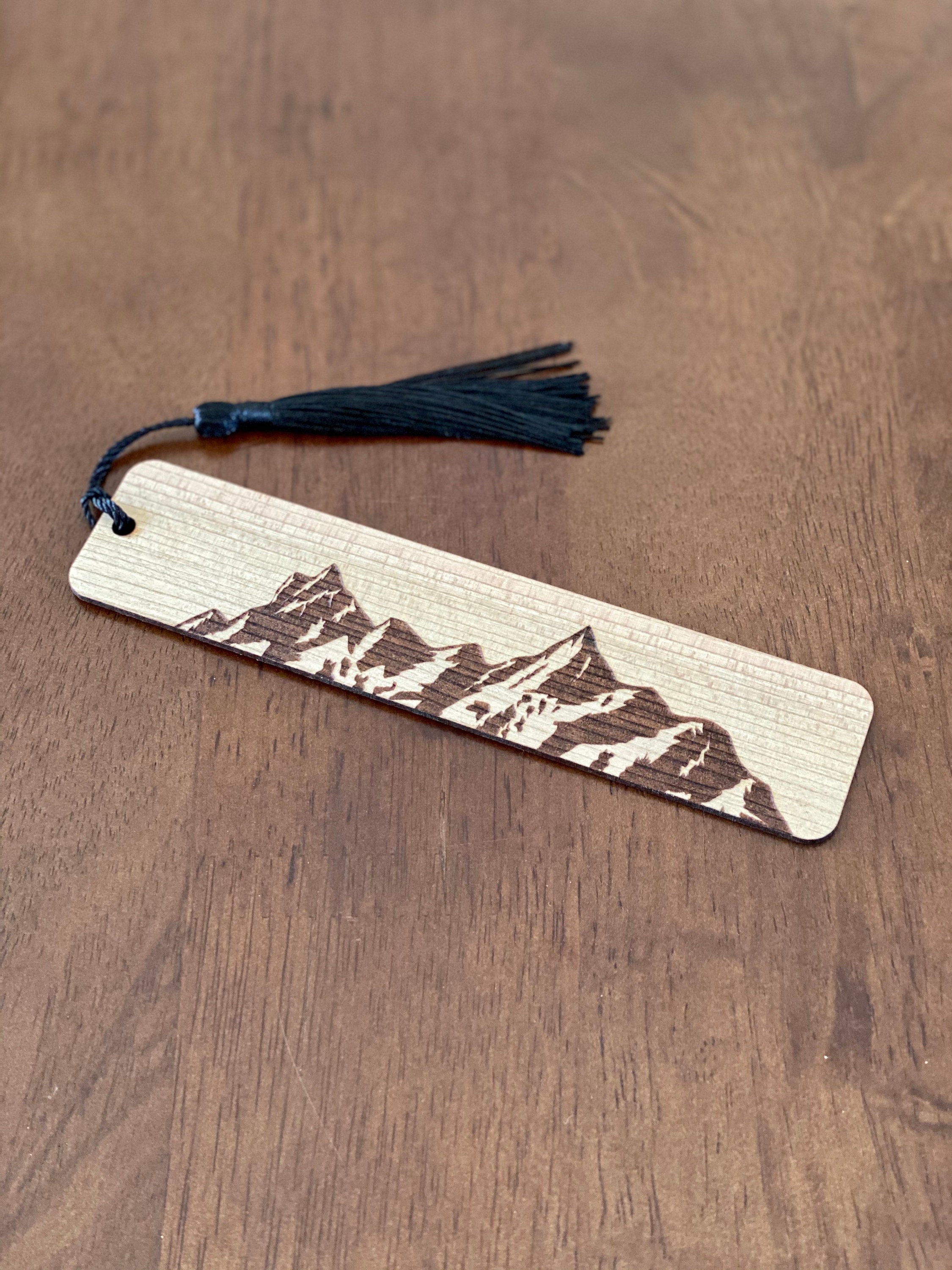 Mountain Engraved Wood Bookmark made of Cherry hardwood with a mountain range design and colorful tassel.