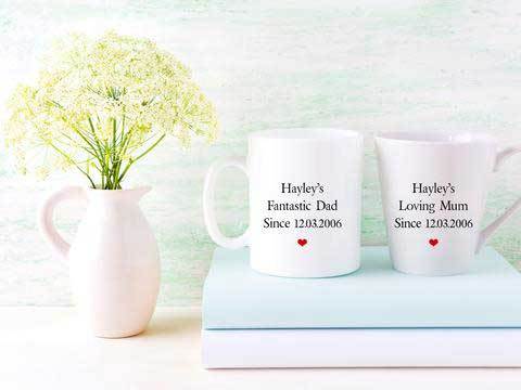 Personalised Mum & Dad mug set featuring a standard and latte mug, beautifully designed with custom names and dates.