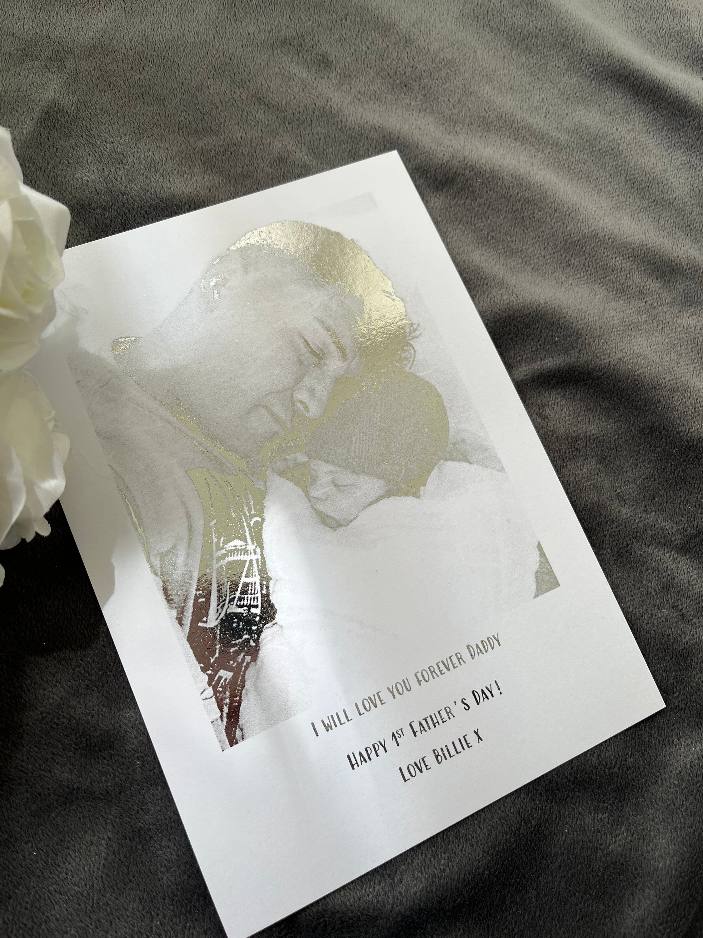 A personalized Father's Day foil print featuring a custom image and quote on a white background with silver foil accents.