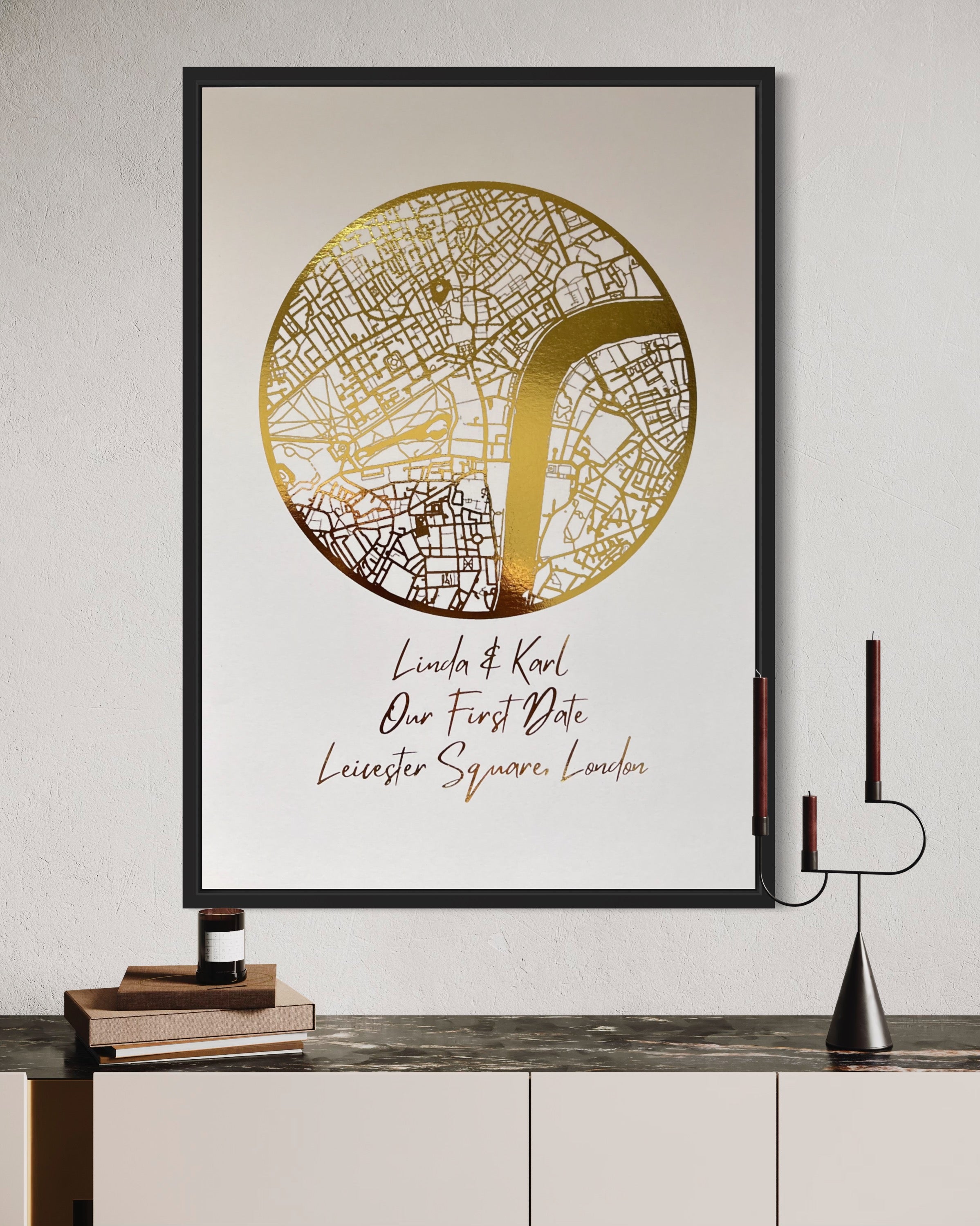 A beautifully crafted gold foil printed map in a circle shape, personalized with names and a location, symbolizing a couple's first date.