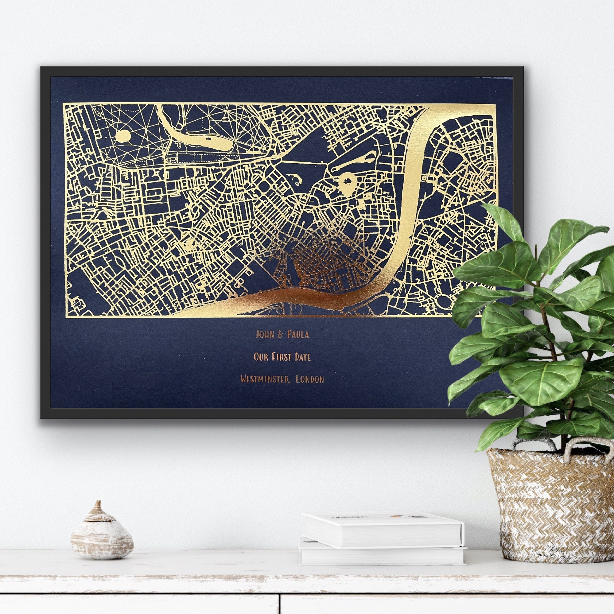 A beautifully designed foil printed map highlighting a couple's first date location, featuring elegant foil accents in various colors.