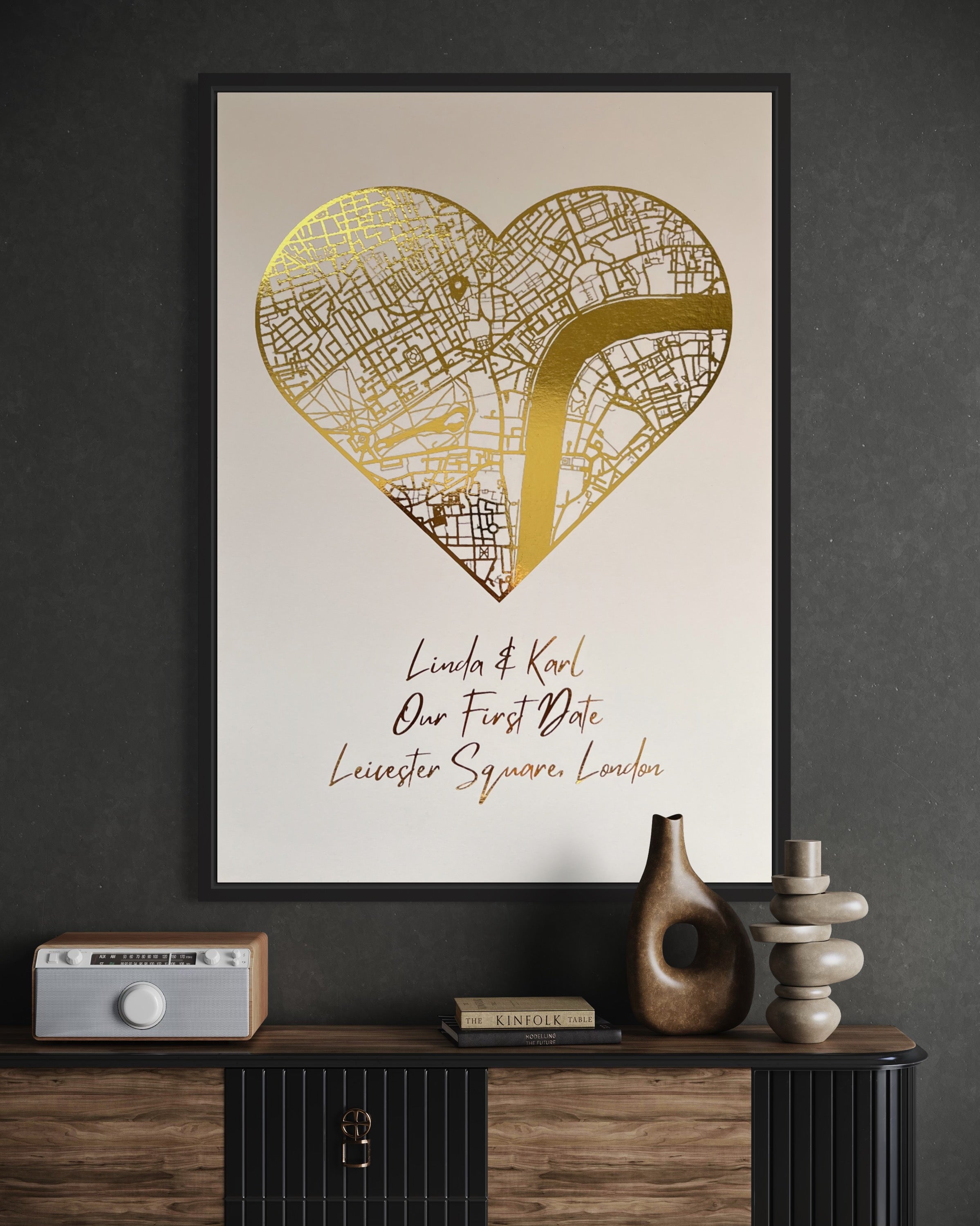 A beautifully crafted heart-shaped map featuring gold foil printing, personalized with couple's names and first date location.