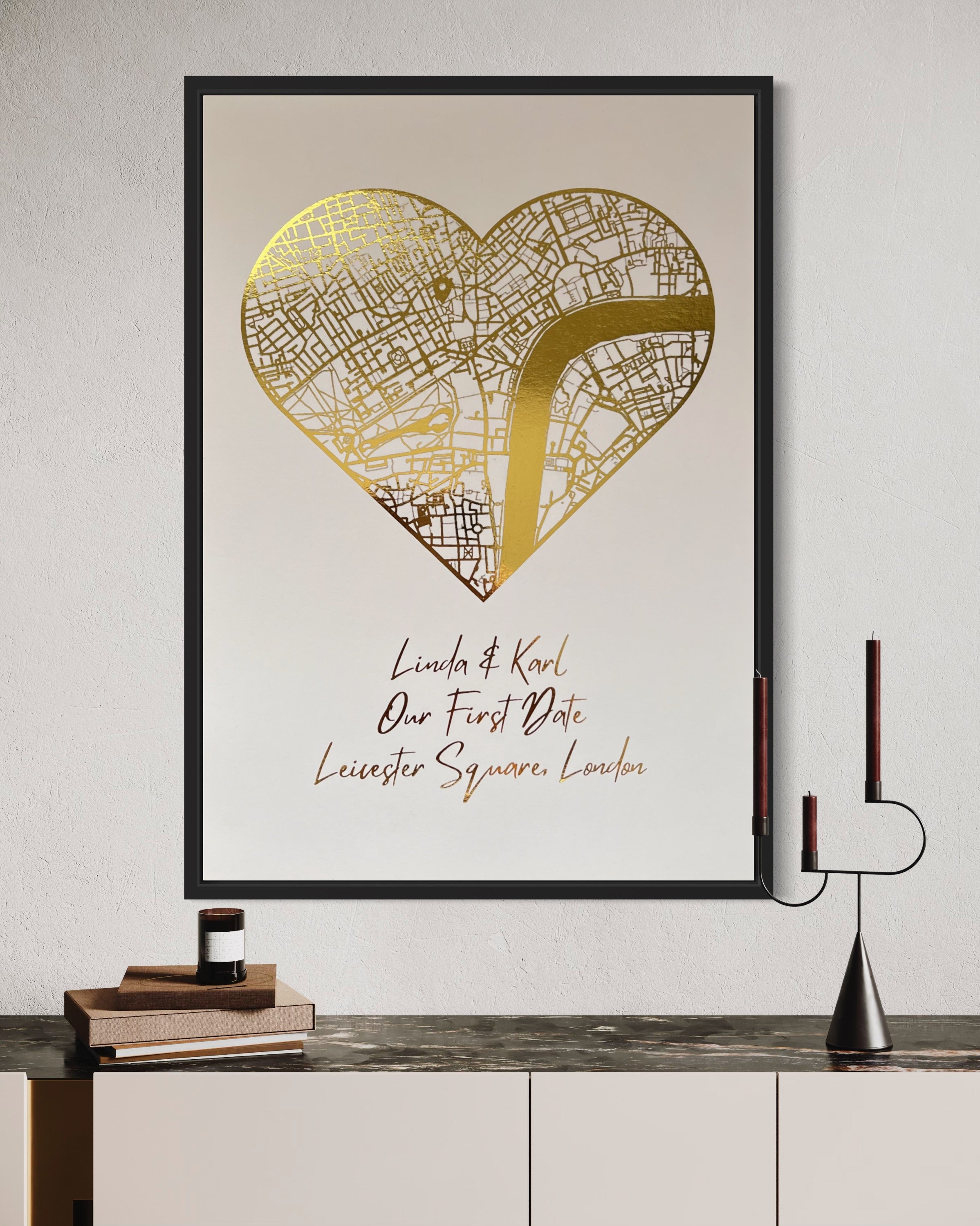 A beautifully crafted heart-shaped map featuring gold foil printing, personalized with couple's names and first date location.