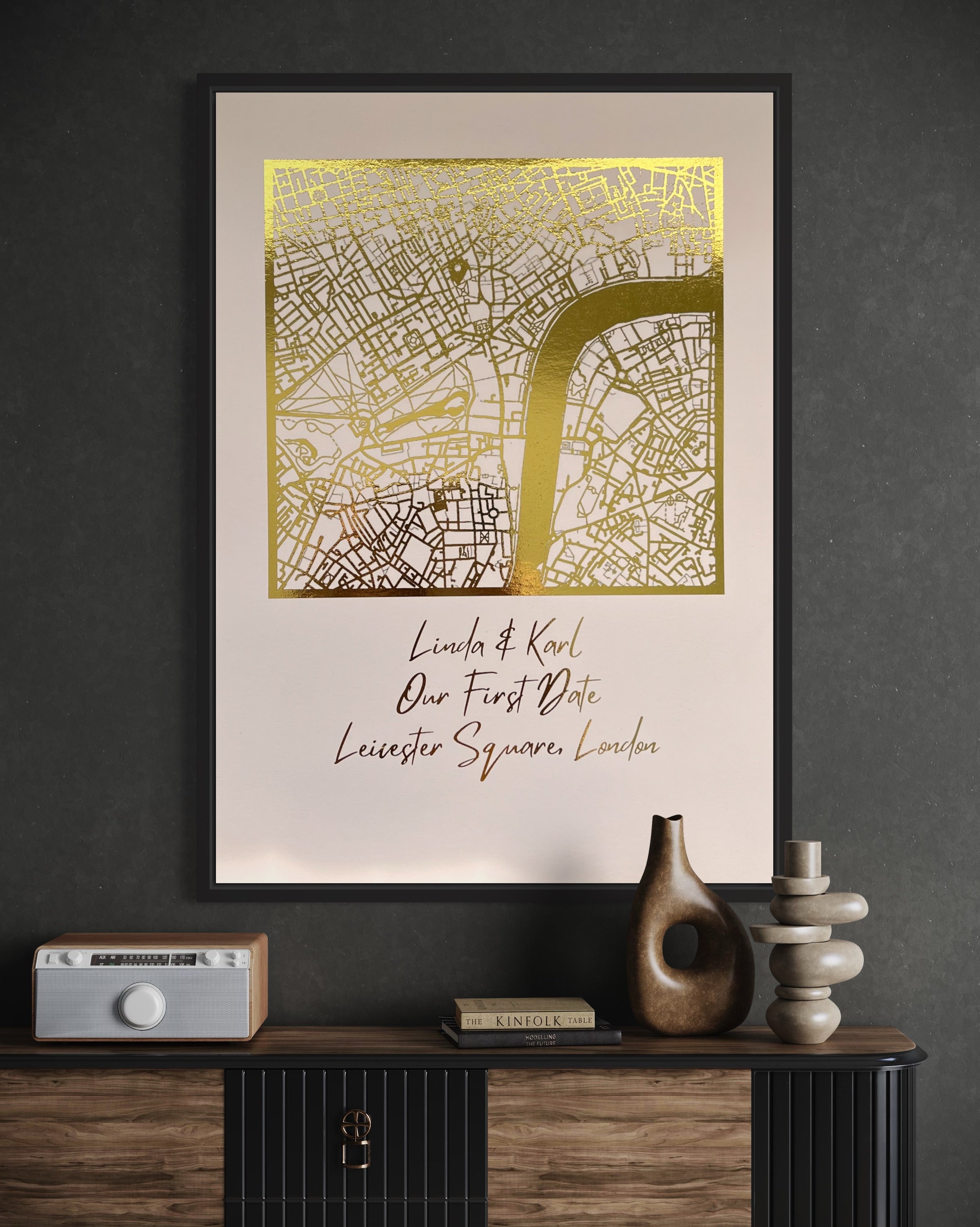 A beautifully crafted square map featuring gold foil accents, personalized with couple's names and first date location.