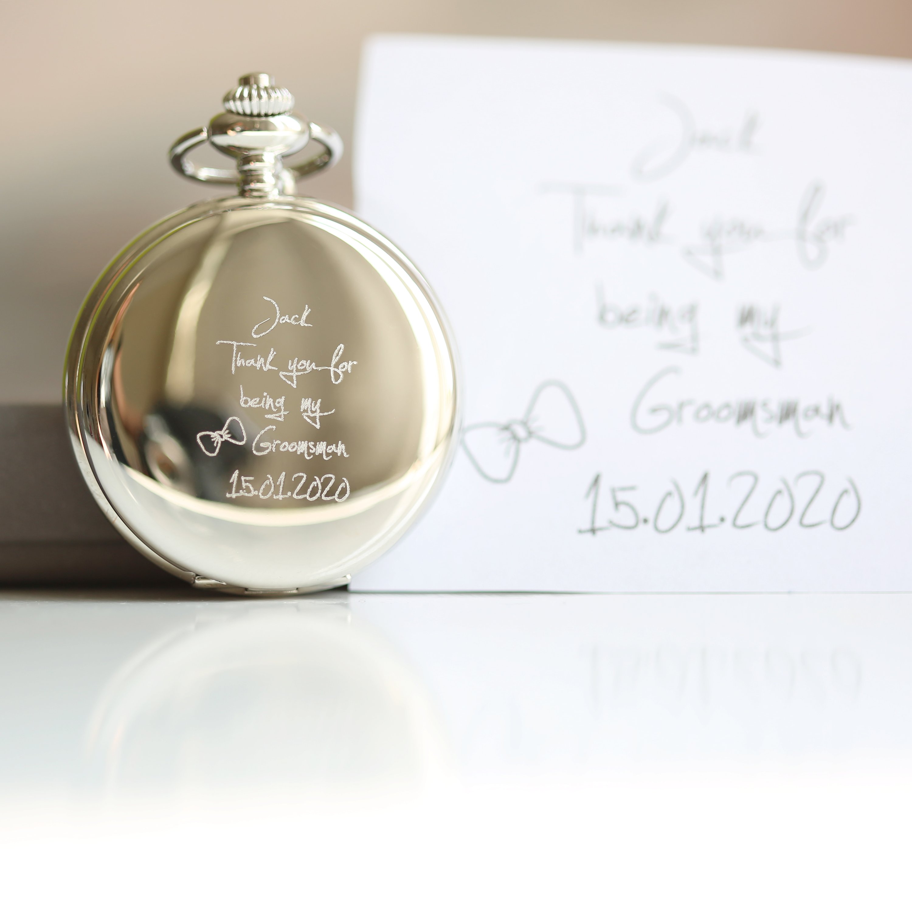 A beautifully crafted dual opening pocket watch featuring a skeleton design, personalized with unique handwriting engraving on both sides.