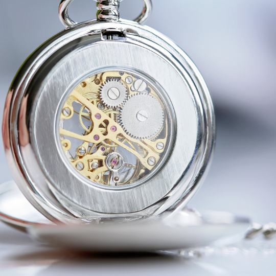 A beautifully crafted dual opening pocket watch featuring a skeleton design, personalized with unique handwriting engraving on both sides.