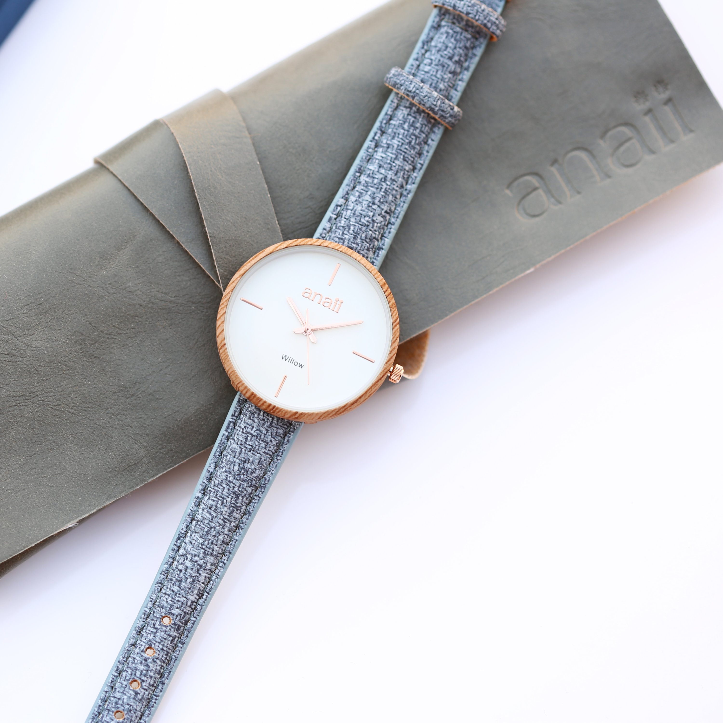 Personalised Anaii Watch in Lake Blue with adjustable stainless steel strap and modern font engraving.