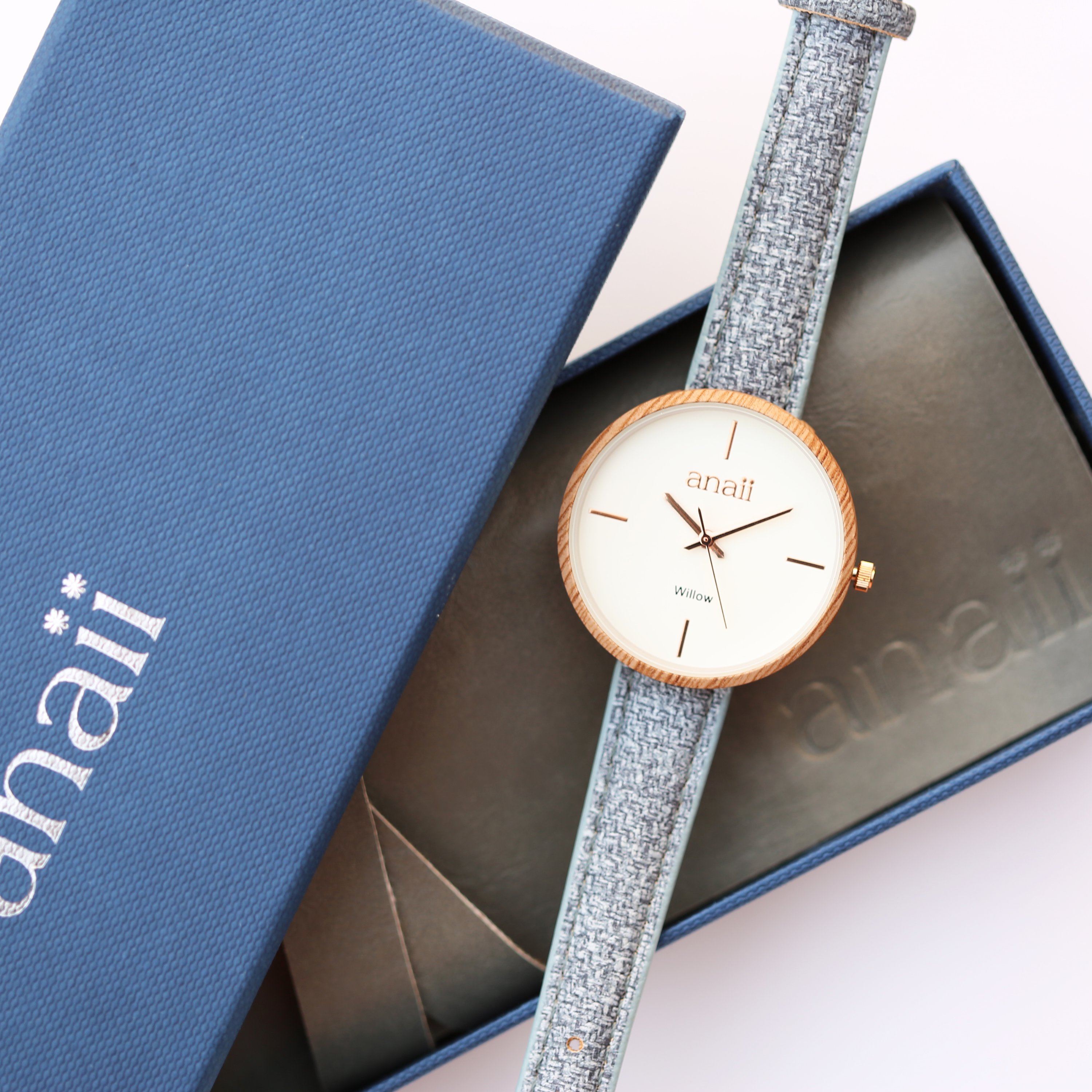 Personalised Anaii Watch in Lake Blue with adjustable stainless steel strap and modern font engraving.