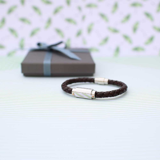 Personalised Twisted Leather Bracelet with engraved magnetic clasp, showcasing its stylish twisted design and genuine leather material.