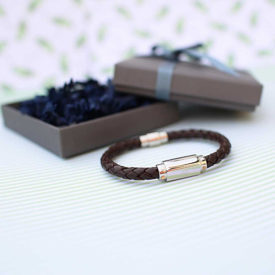 Personalised Twisted Leather Bracelet with engraved magnetic clasp, showcasing its stylish twisted design and genuine leather material.