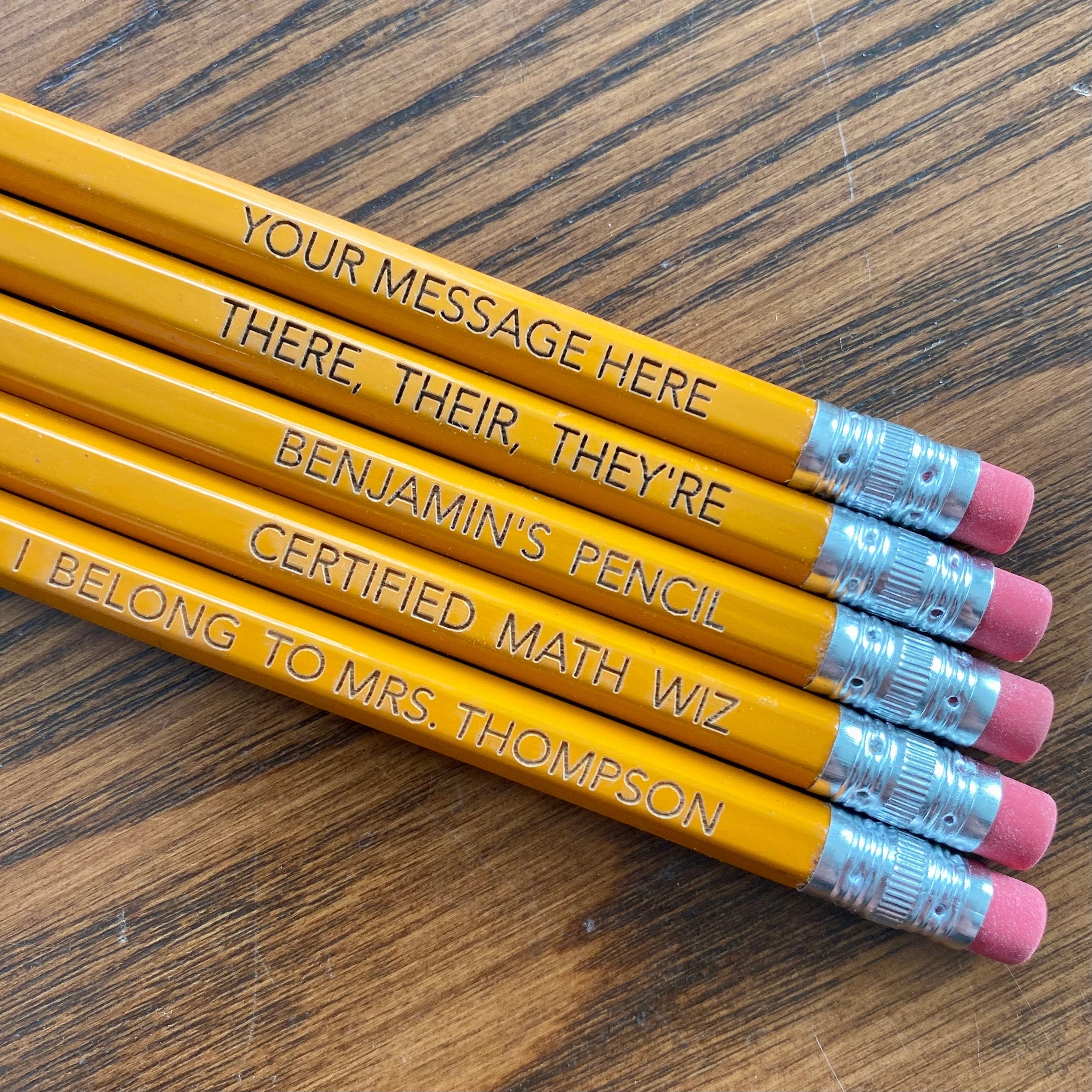 A set of personalized #2 pencils with laser engraving, showcasing custom messages and names.