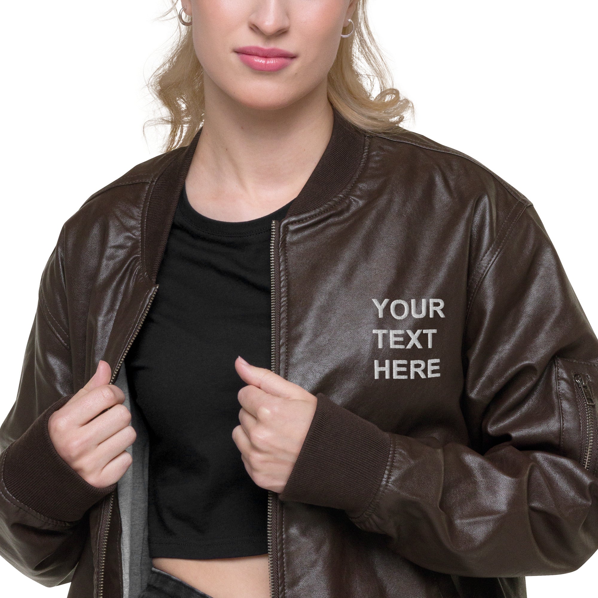 A stylish personalized embroidered leather jacket made from 100% PU leather, featuring rib-knit banding and multiple pockets.