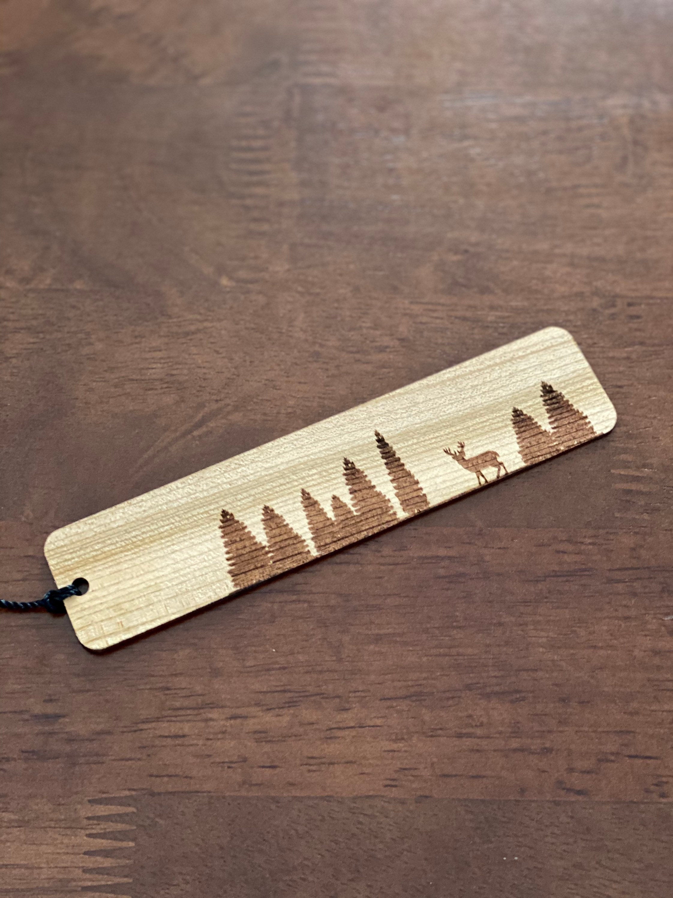 Pine Tree & Deer Engraved Wood Bookmark made from Cherry hardwood with a tassel.