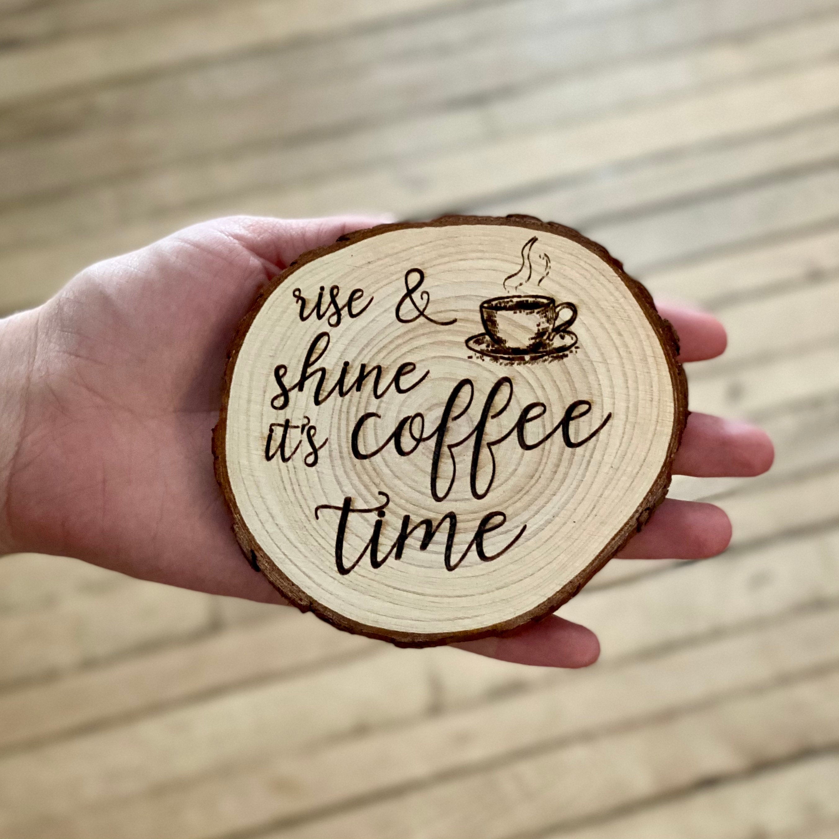 Set of four rustic engraved wood coasters made from Californian Pine, featuring intricate coffee-themed designs.