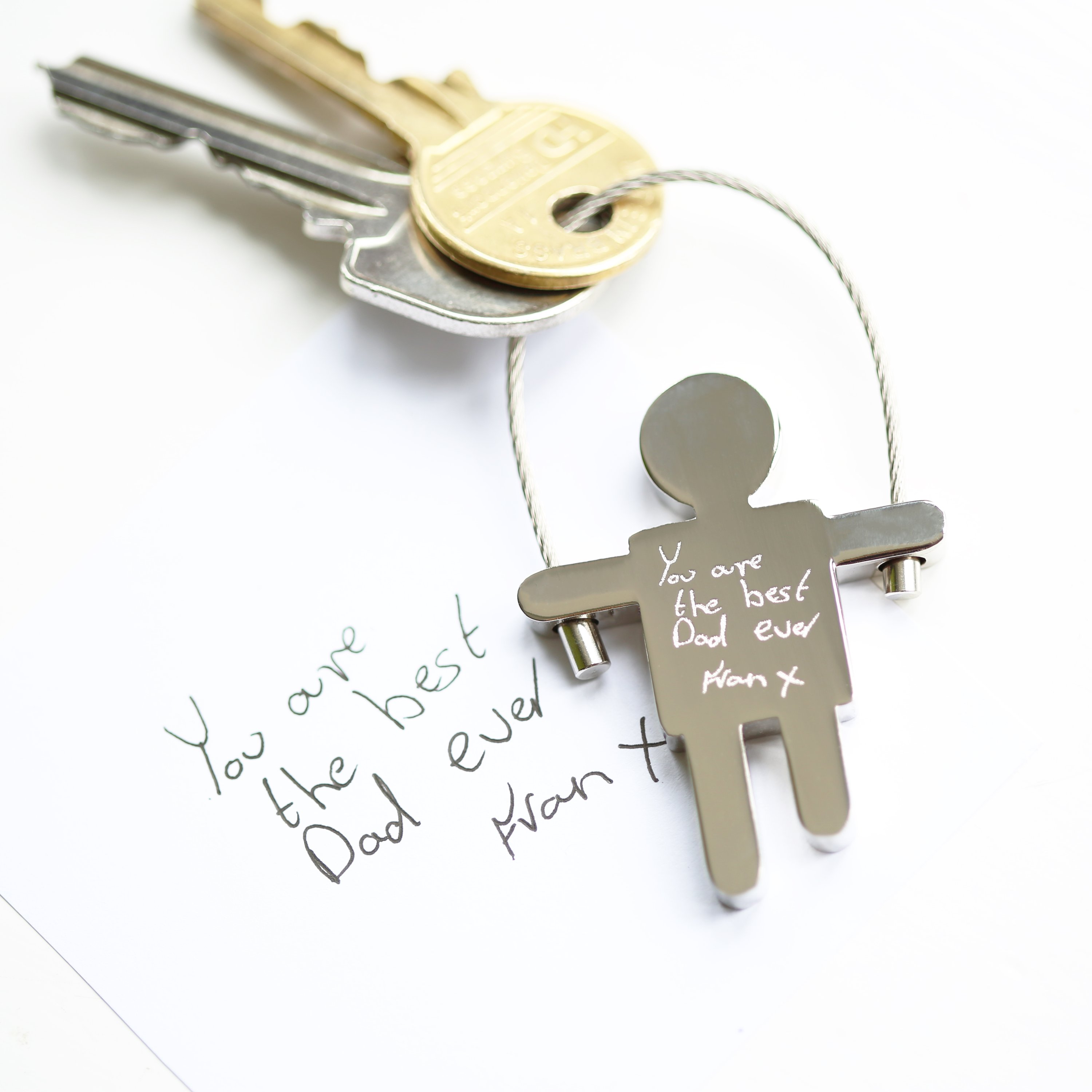 Personalised Skipping Sam Key Ring with custom handwriting engraving, featuring a durable stainless steel design and skipping rope wire.