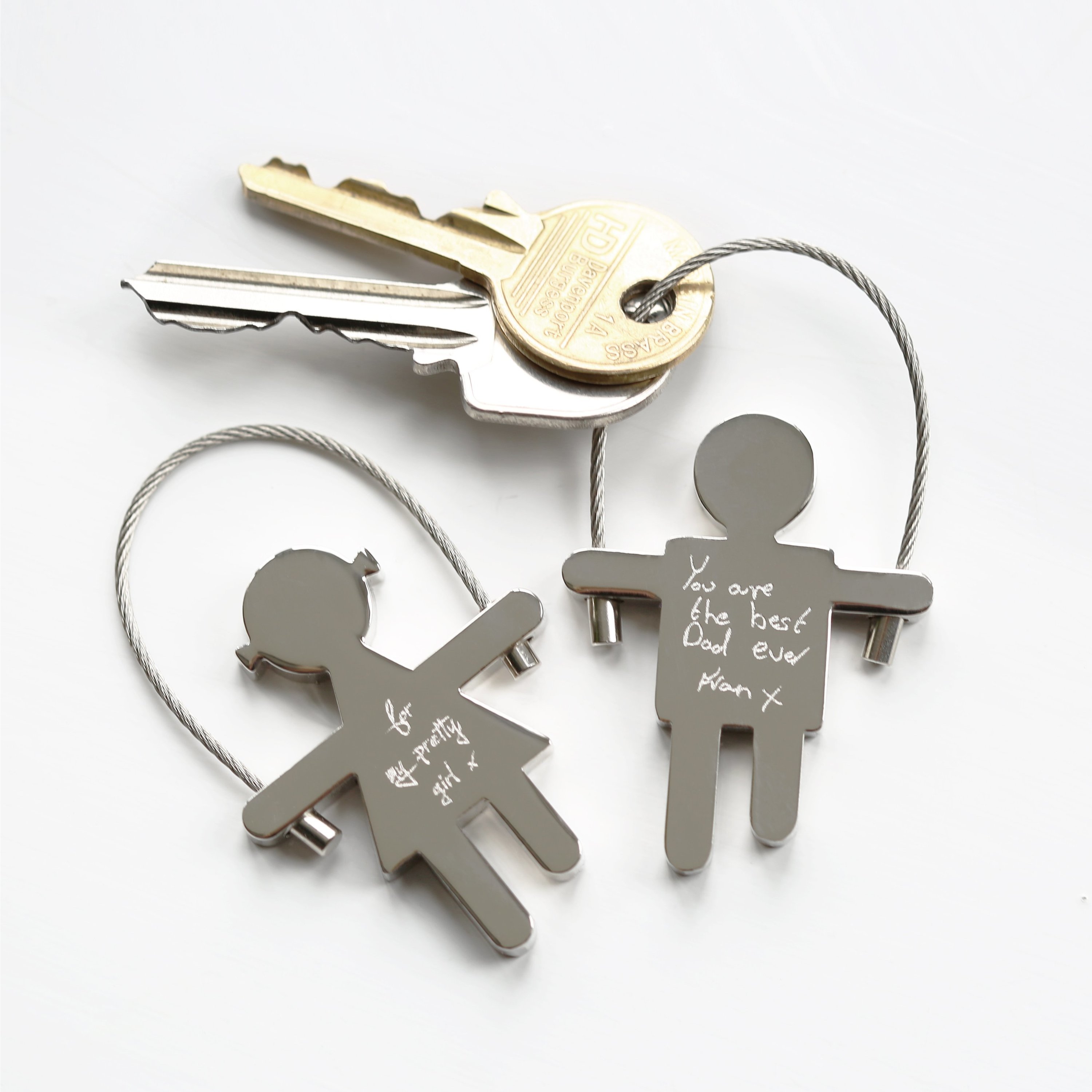 Personalised Skipping Sam Key Ring with custom handwriting engraving, featuring a durable stainless steel design and skipping rope wire.